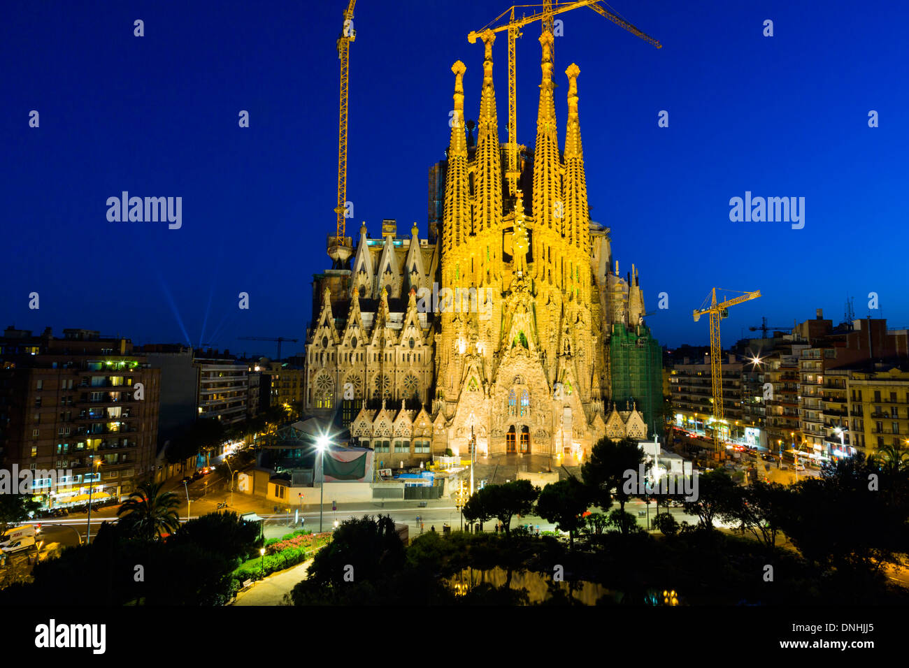 Church in a city, Sagrada Familia, Barcelona, Catalonia, Spain Stock Photo
