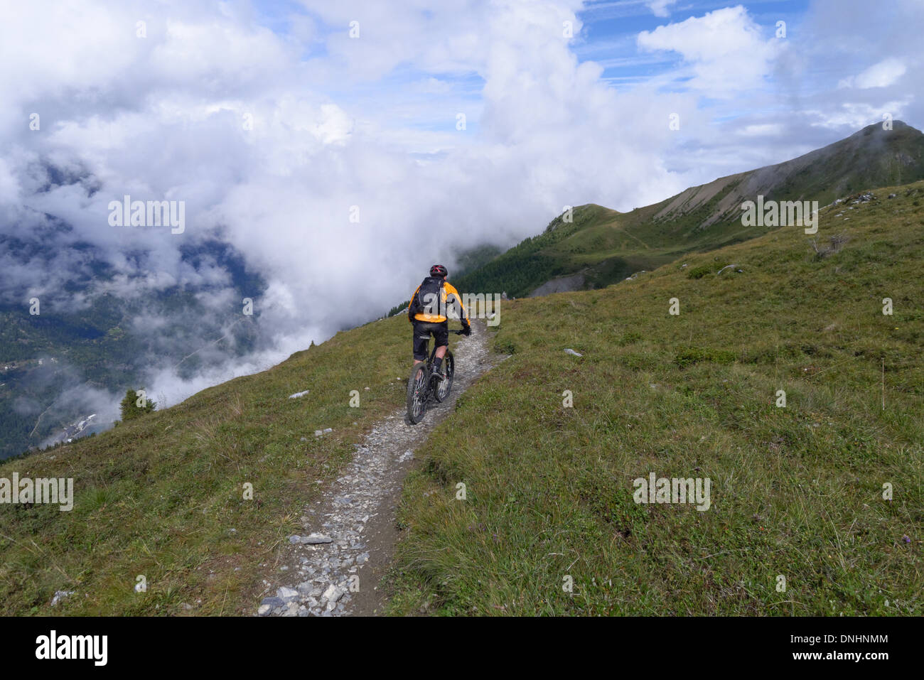 Mountain bikers on the Tour de Mont Blanc in the Alps Stock Photo