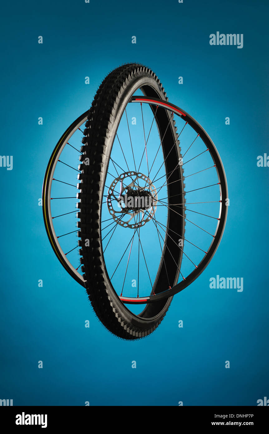 A bicycle wheel and tire separated but together. Stock Photo