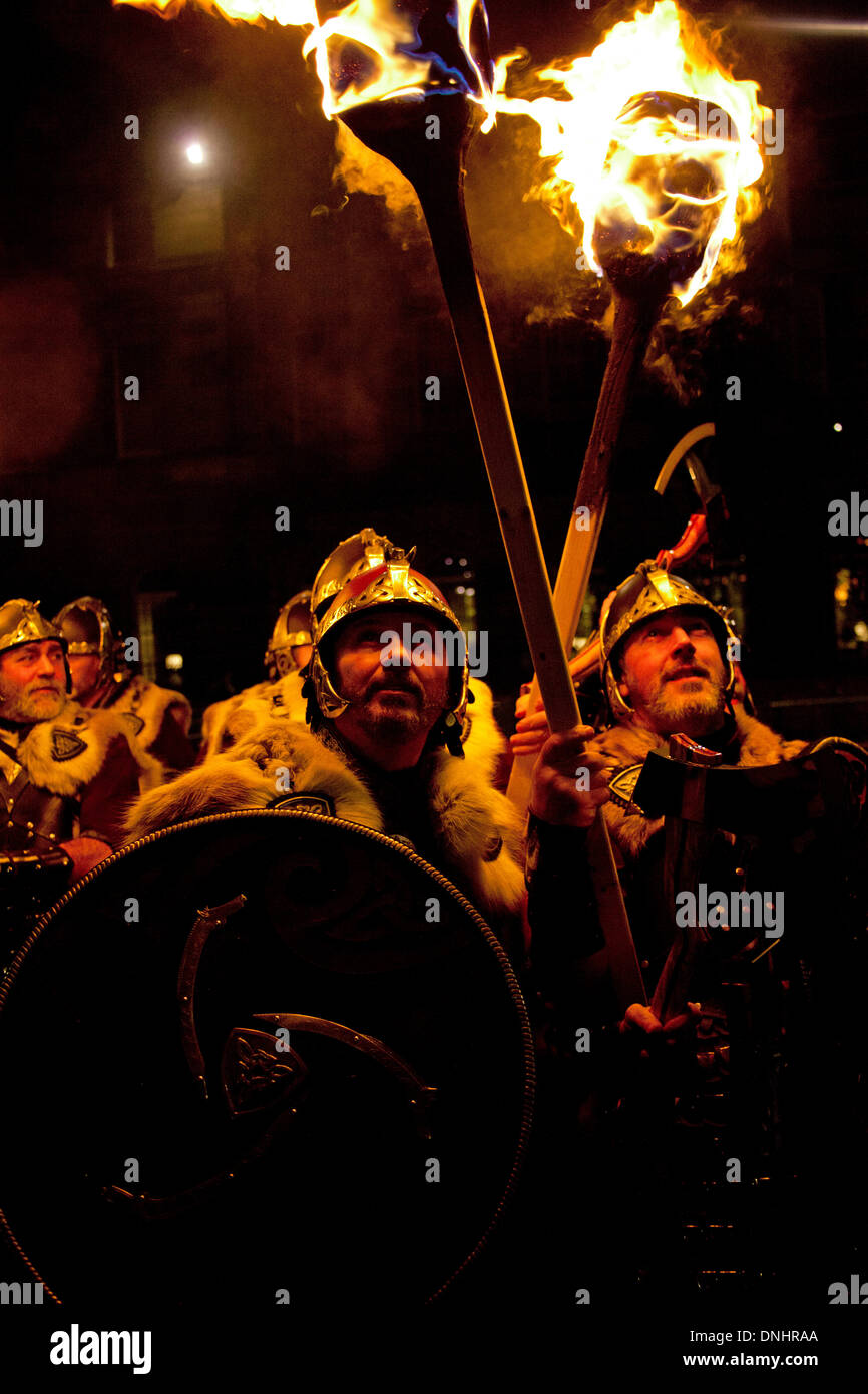 Edinburgh, Scotland, UK. 30th December 2013, Start of Edinburgh's Hogmanay celebrations with Vikings from the torchlight Procession and fireworks on Calton Hill from the Son et lumiere finale of the procession, Scotland UK Credit:  Arch White/Alamy Live News Stock Photo