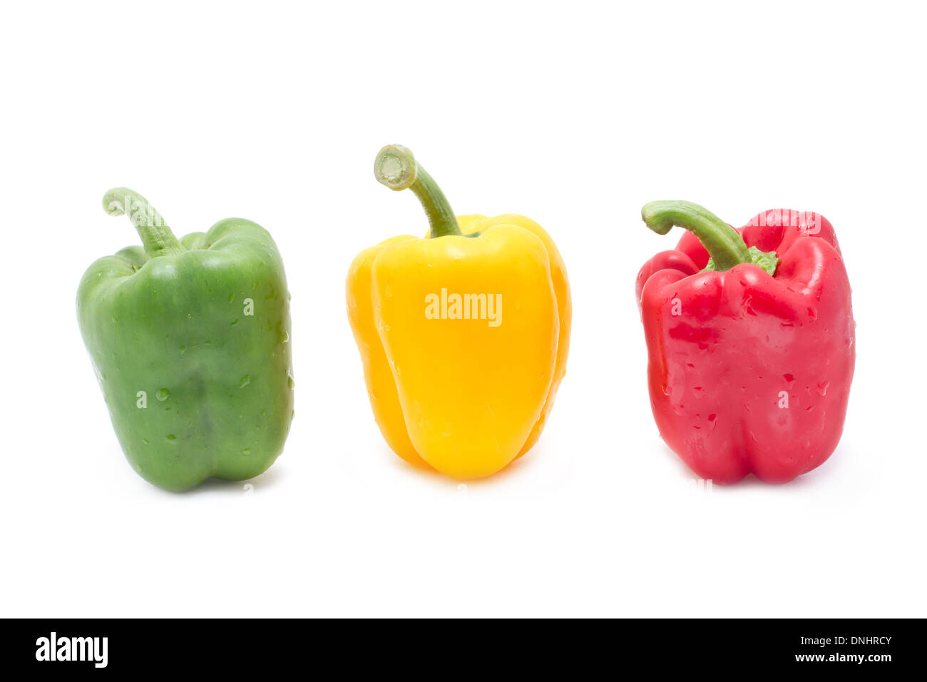 Colorful bell peppers isolated on white background Stock Photo - Alamy