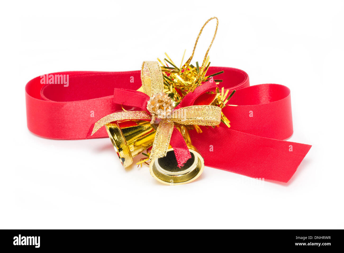 Christmas golden bell with red ribbon isolated on white background ...