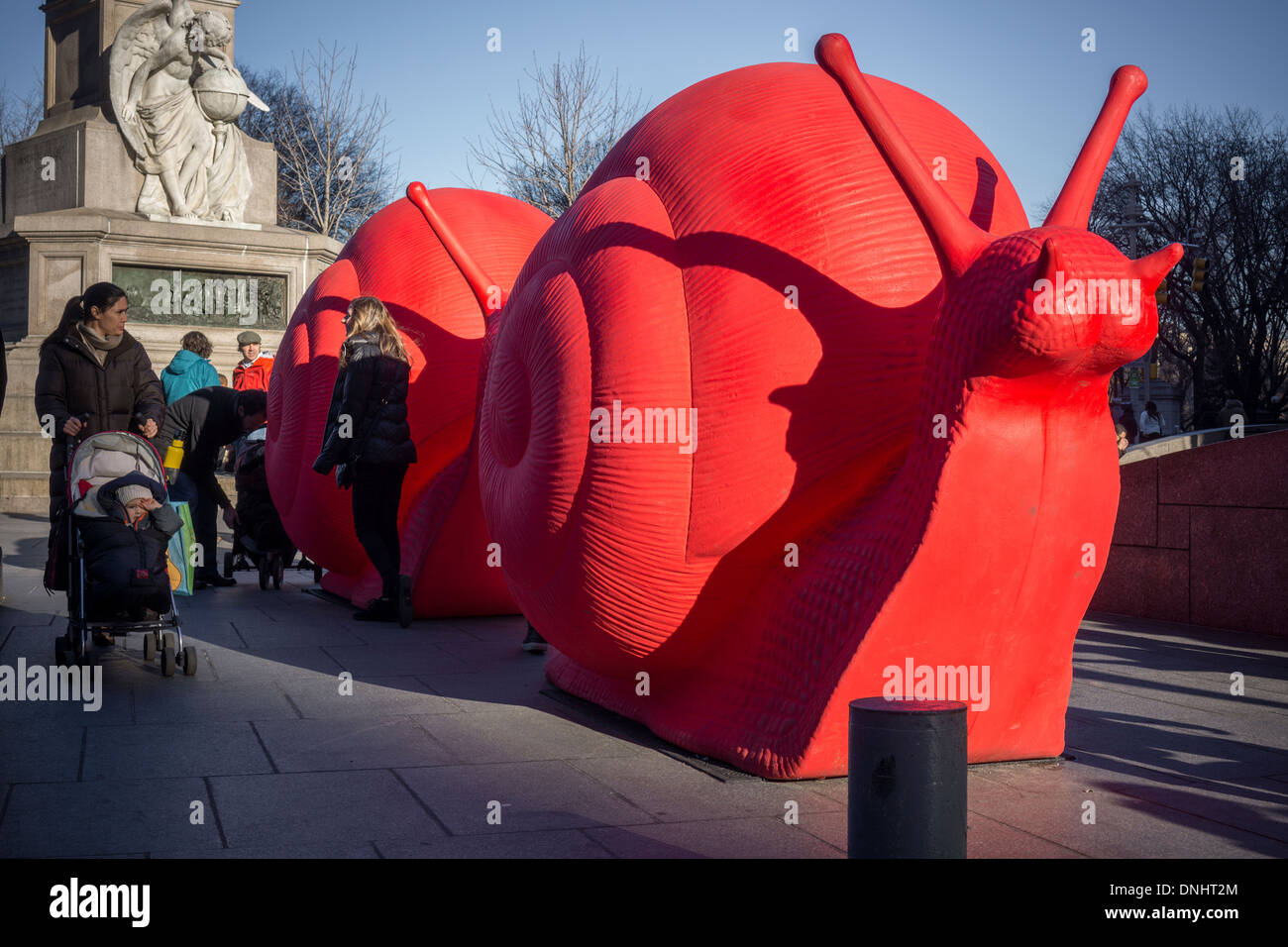 Giant snail sculptures on display in Columbus Circle in New York Stock