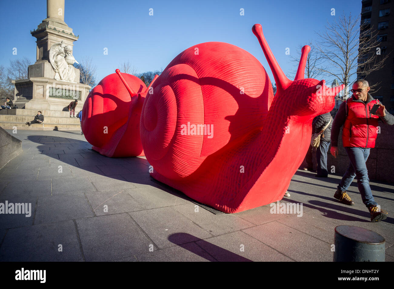 Giant snail sculptures on display in Columbus Circle in New York Stock