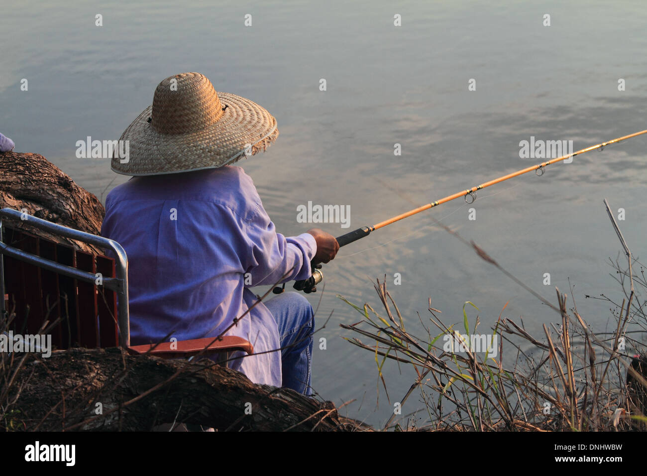 Straw hat fishing pole hi-res stock photography and images - Page