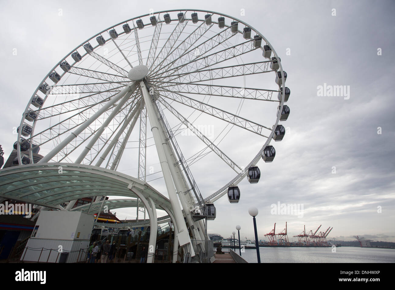 Wide angle shot of Seattle Great Wheel on a cloudy day. Stock Photo