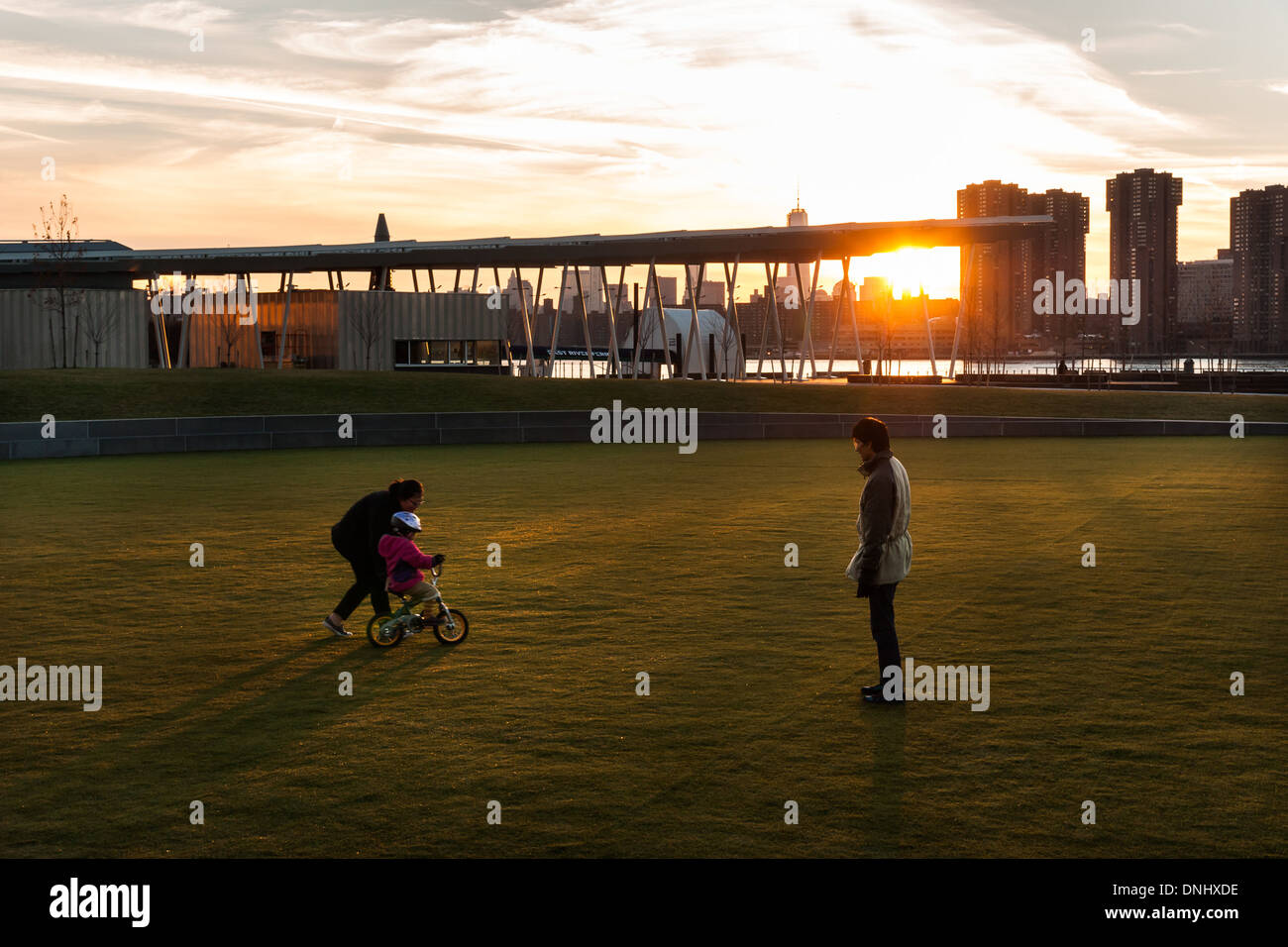Family playing at the Gantry State park in Long Island city Stock Photo