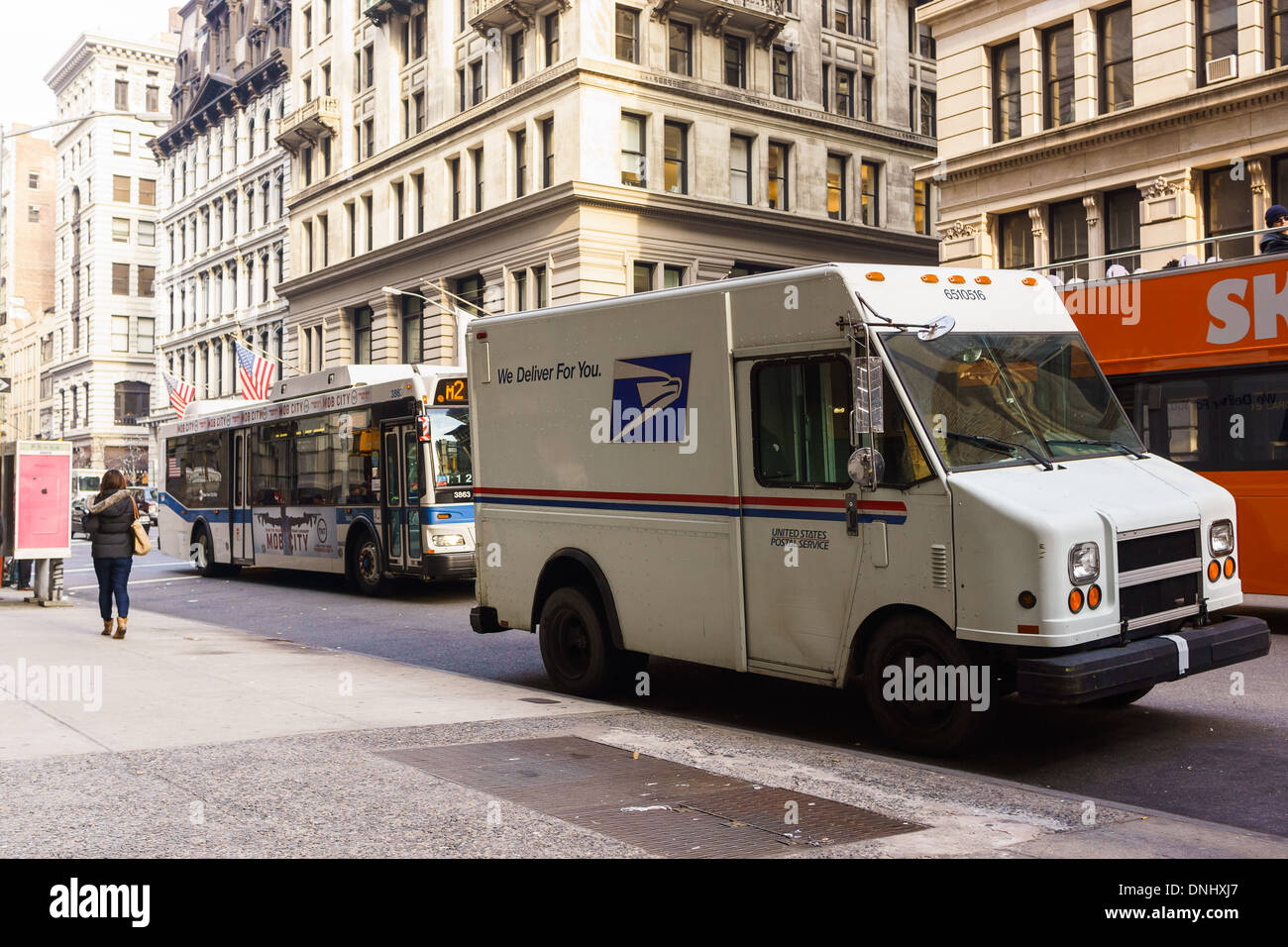 USPS truck delivering packages in Fifth AVE and 17th Street during the