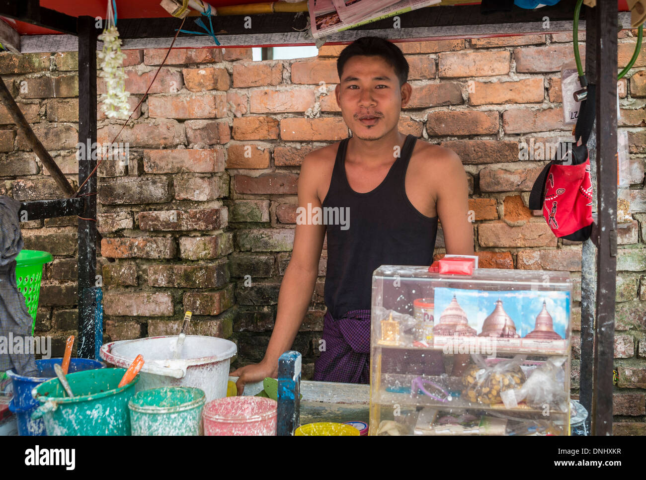 YANGON, MYANMAR - CIRCA DECEMBER 2013: Betel nut seller in the street of Yangon Stock Photo