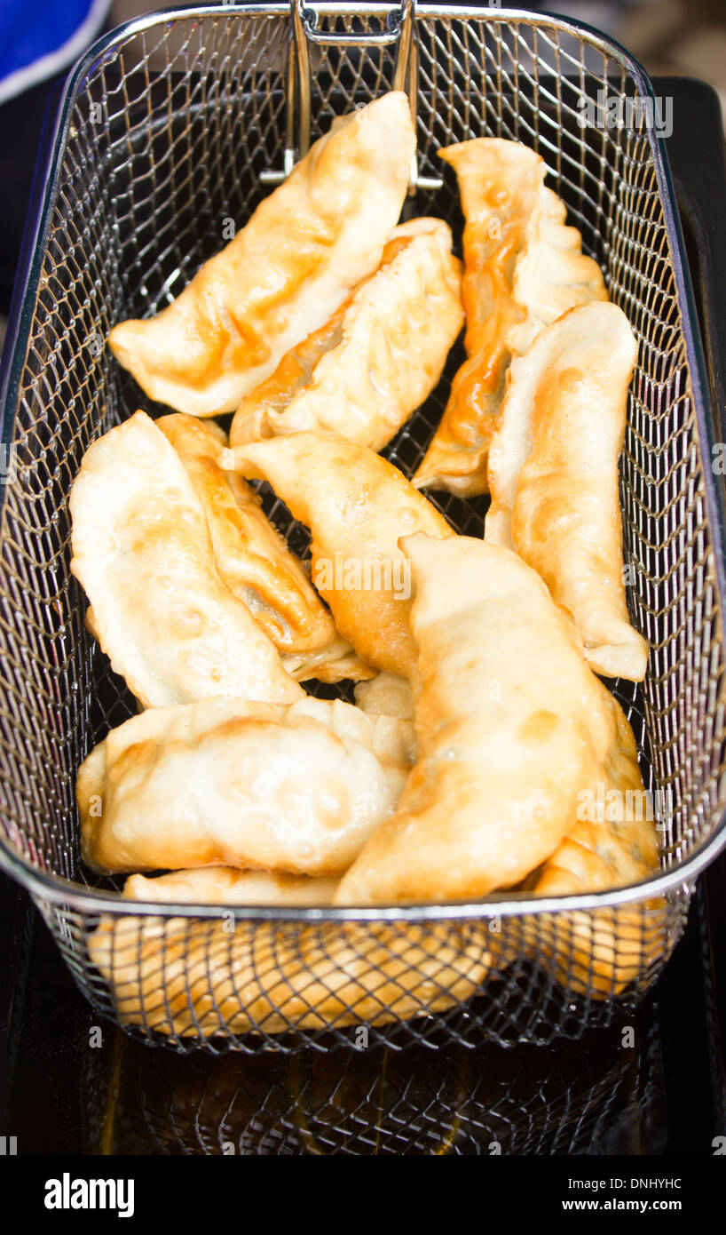 Gyoza deep fried in stove Stock Photo Alamy