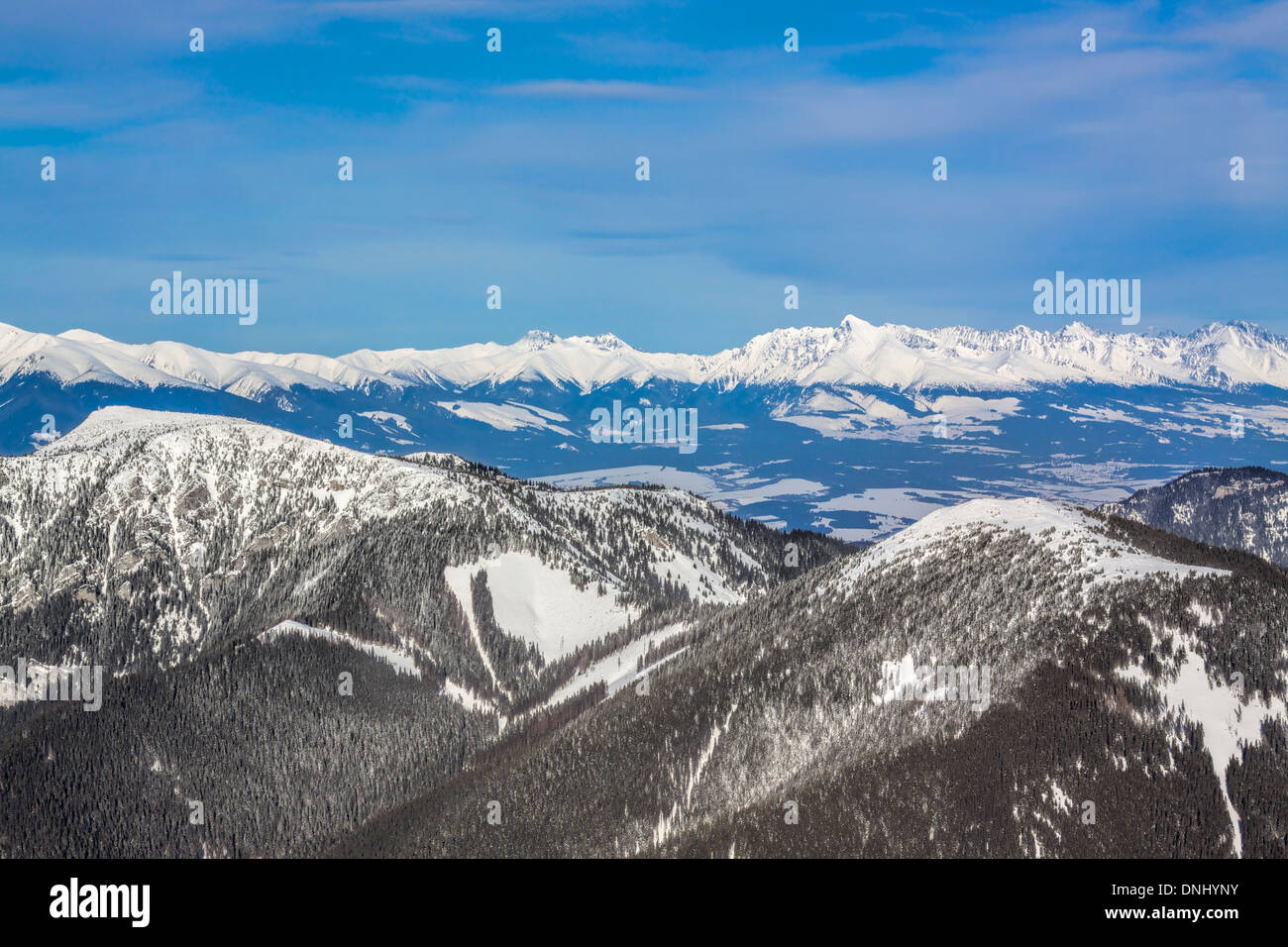 Aerial view of snowy mountains hi-res stock photography and images - Alamy