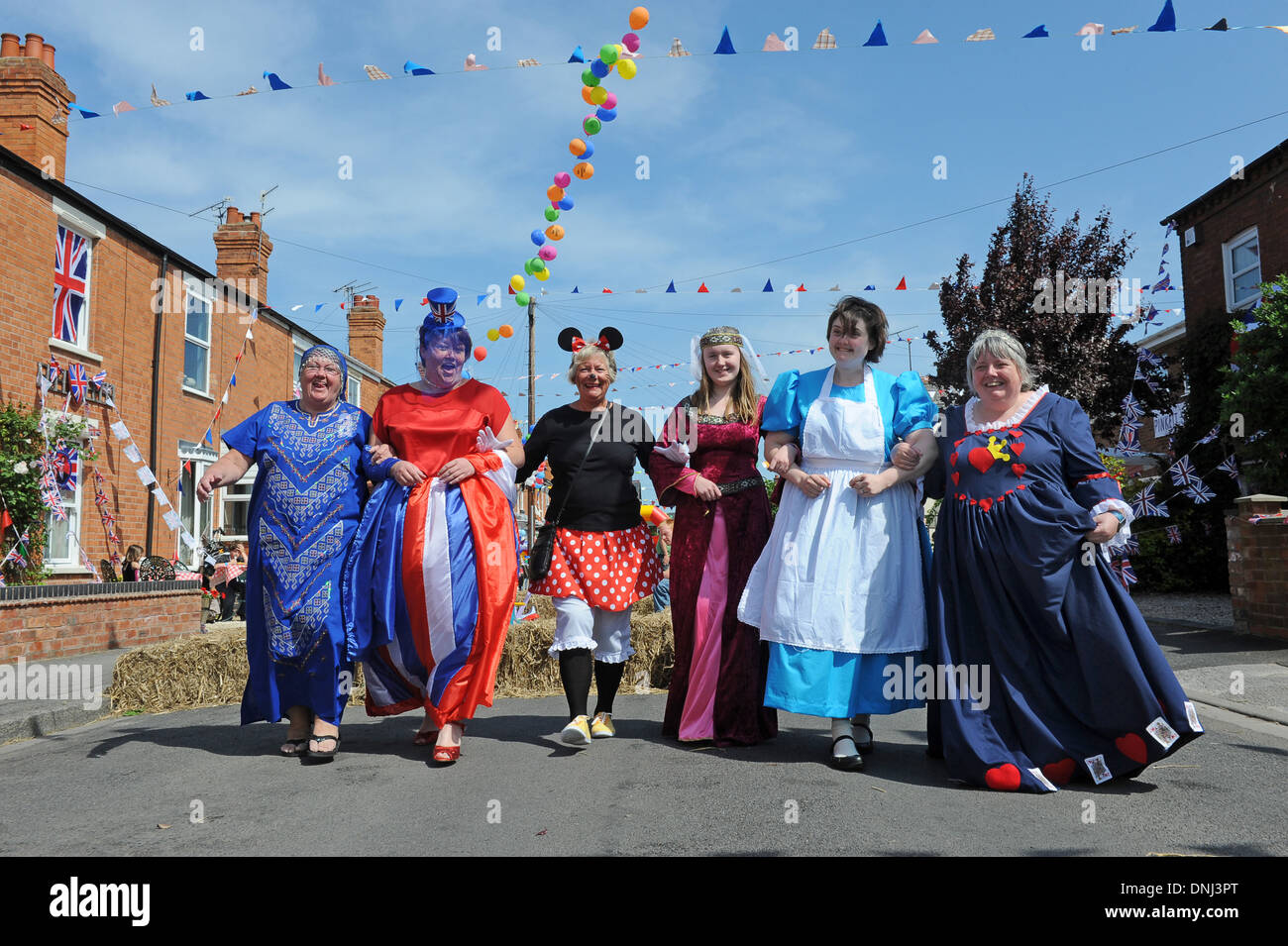Ladies in fancy dress at Royal Wedding street party in Pinkett Street, Worcester, England Uk