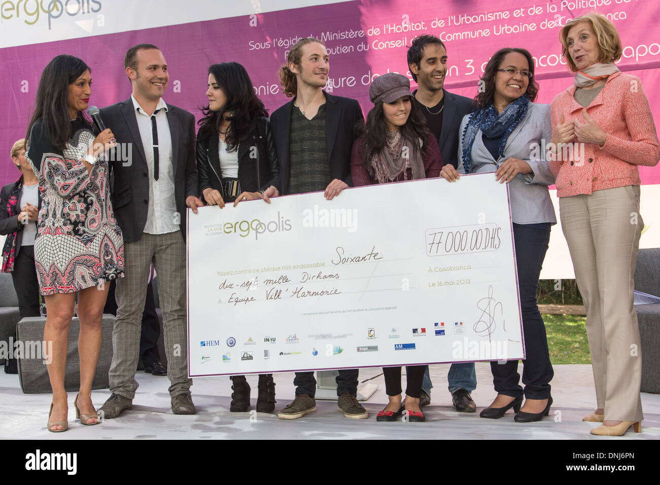 NICOLE BRICQ (RIGHT), MINISTER FOR FOREIGN TRADE, WITH STUDENTS FROM THE VILL'HARMONIE TEAM, WINNERS OF THE ERGAPOLIS COMPETITION, AND ESTELLE FORGET (LEFT), FOUNDER OF ERGAPOLIS, CASABLANCA, MAY 16, 2013 Stock Photo