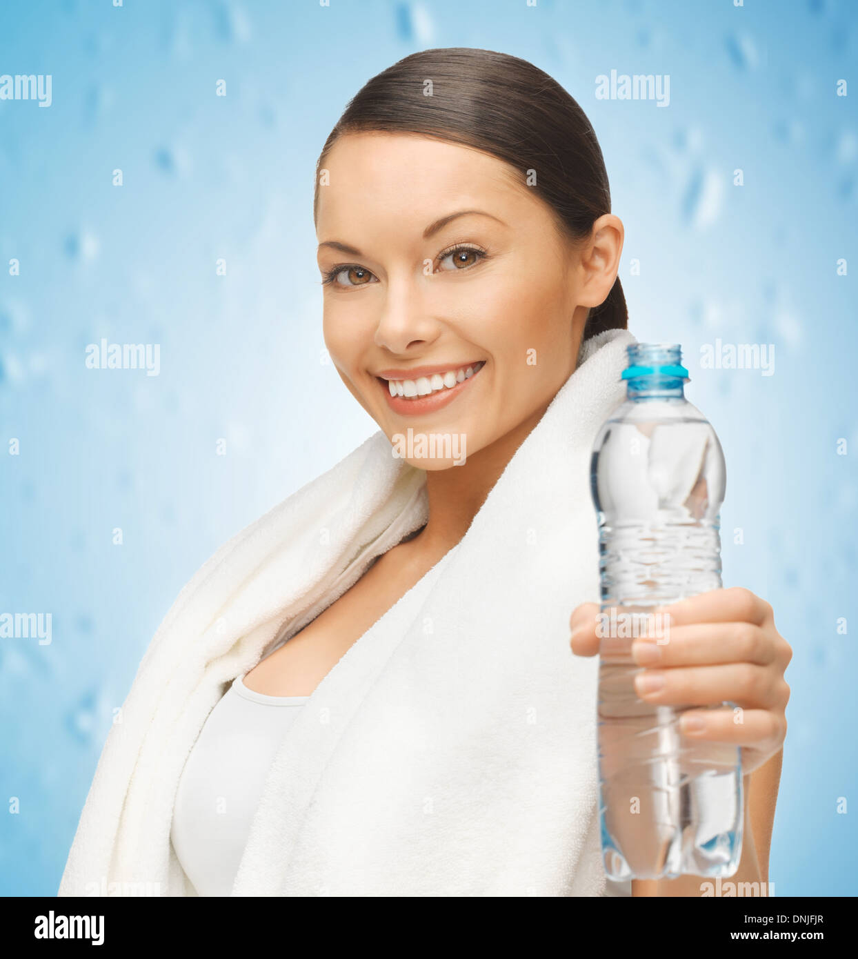 woman with towel and bottle of water Stock Photo - Alamy