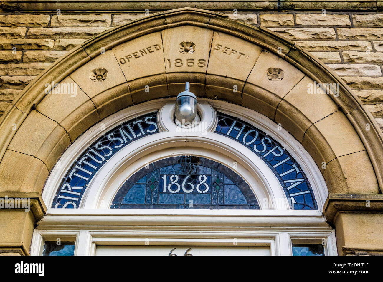 Fanlight at the entrance of the Sir Titus Salt Hospital, now apartments. Saltaire, West Yorkshire. Stock Photo