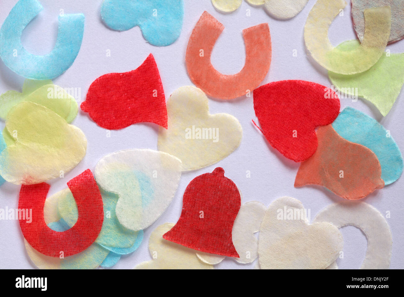 bio-degradable wedding confetti spread out on white background close up Stock Photo