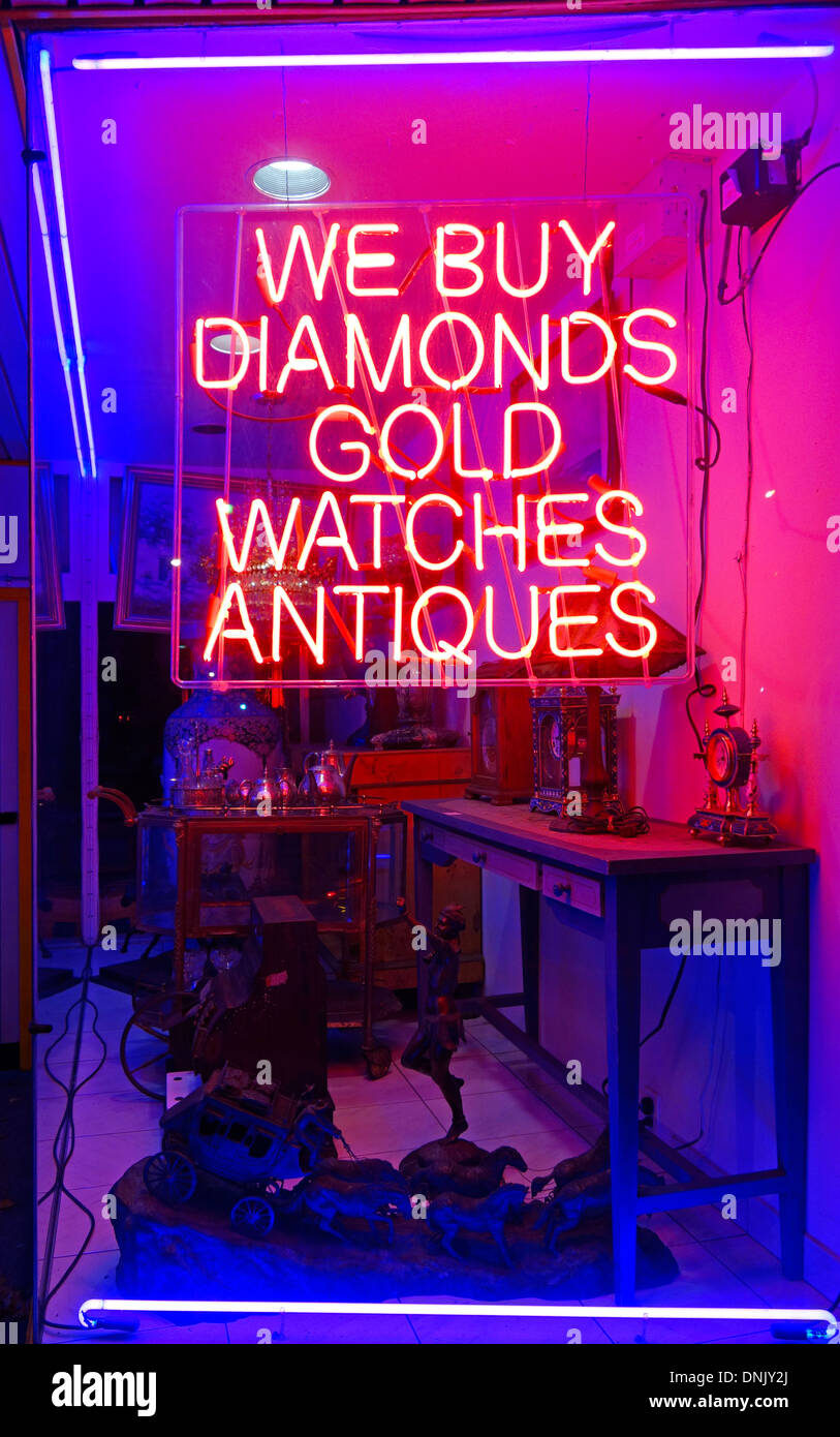 we buy diamonds neon sign Stock Photo