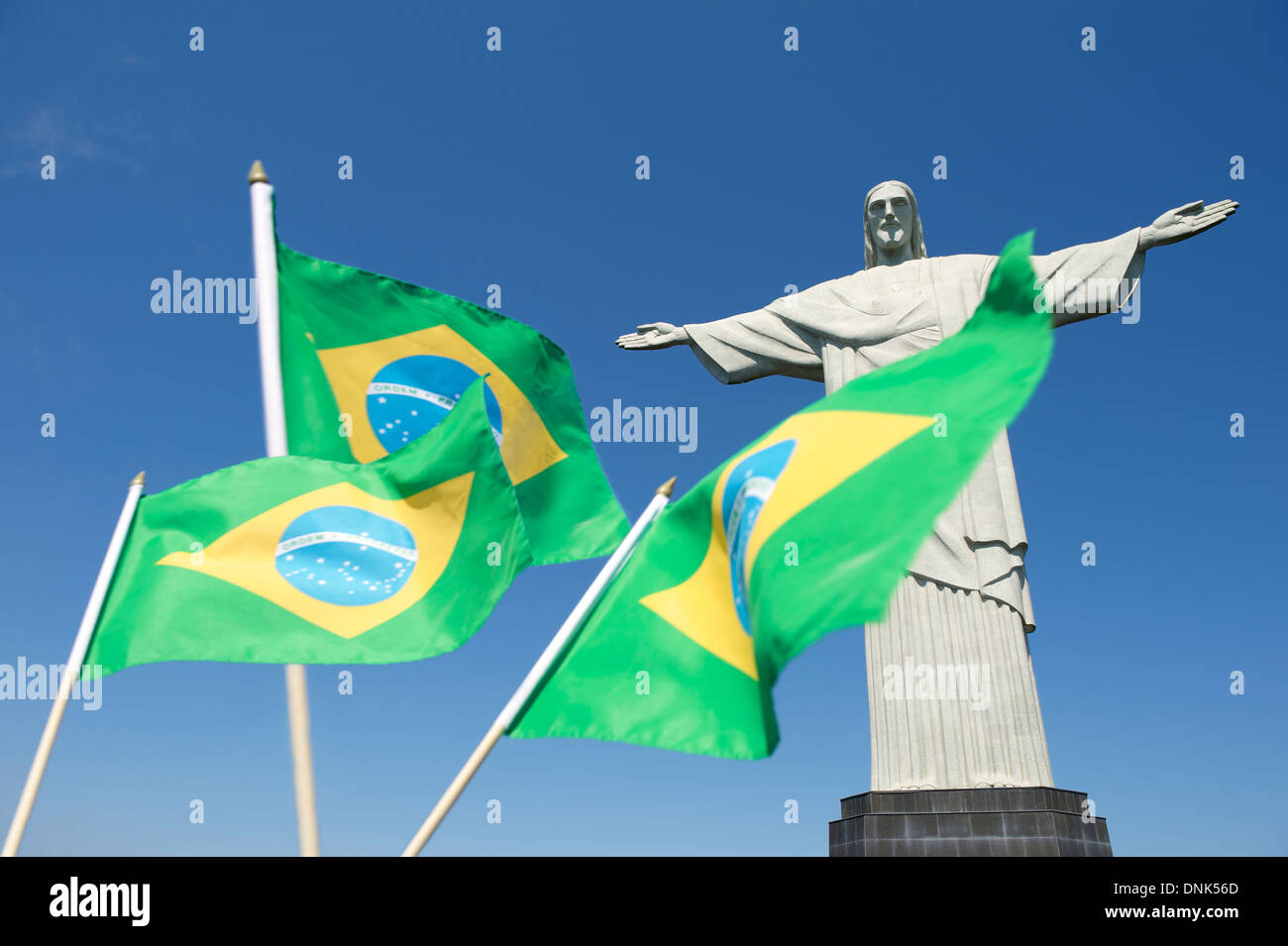 Brazilian flags waving in celebration at Corcovado Christ the Redeemer Rio de Janeiro Brazil Stock Photo