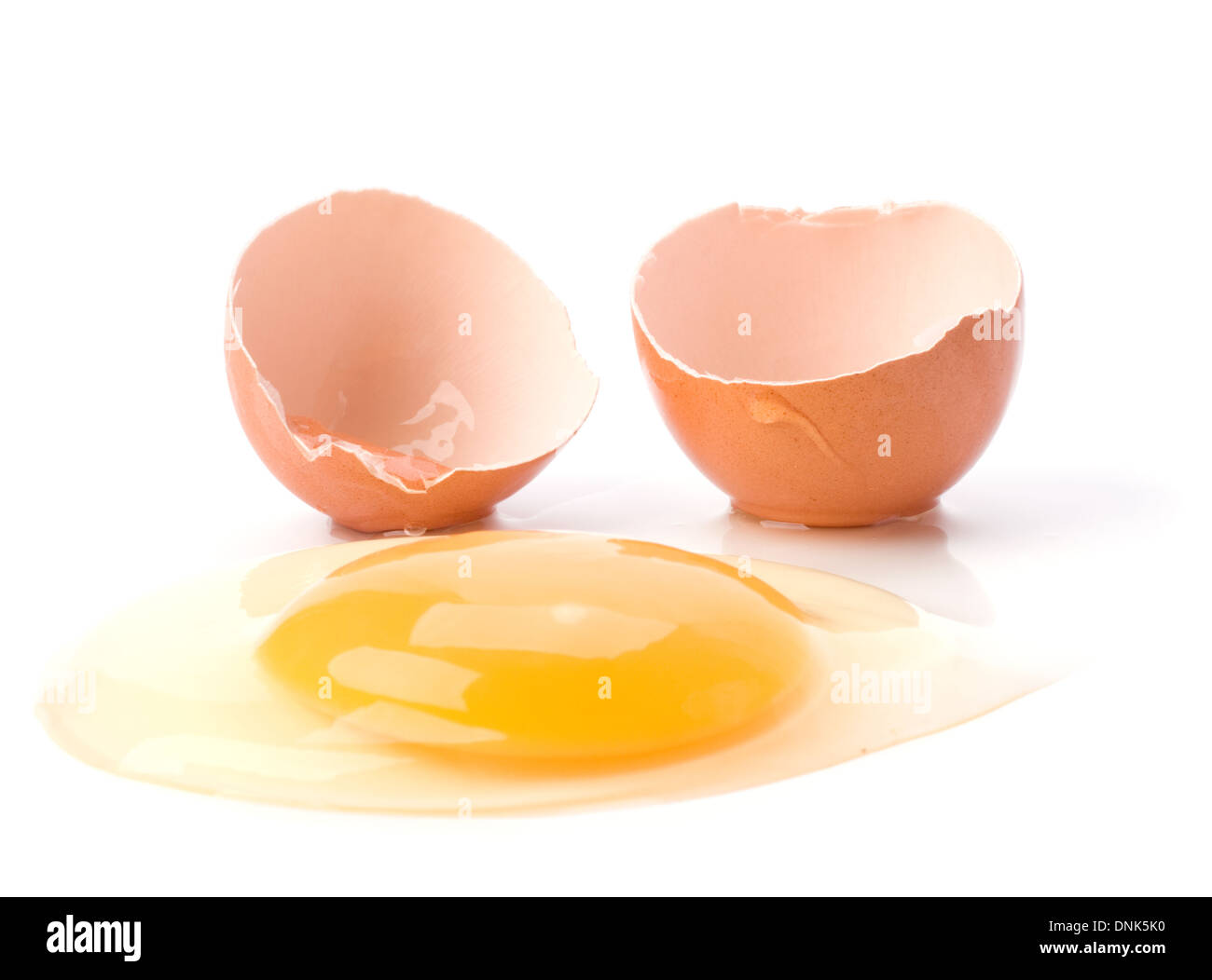 broken egg isolated on white background Stock Photo - Alamy