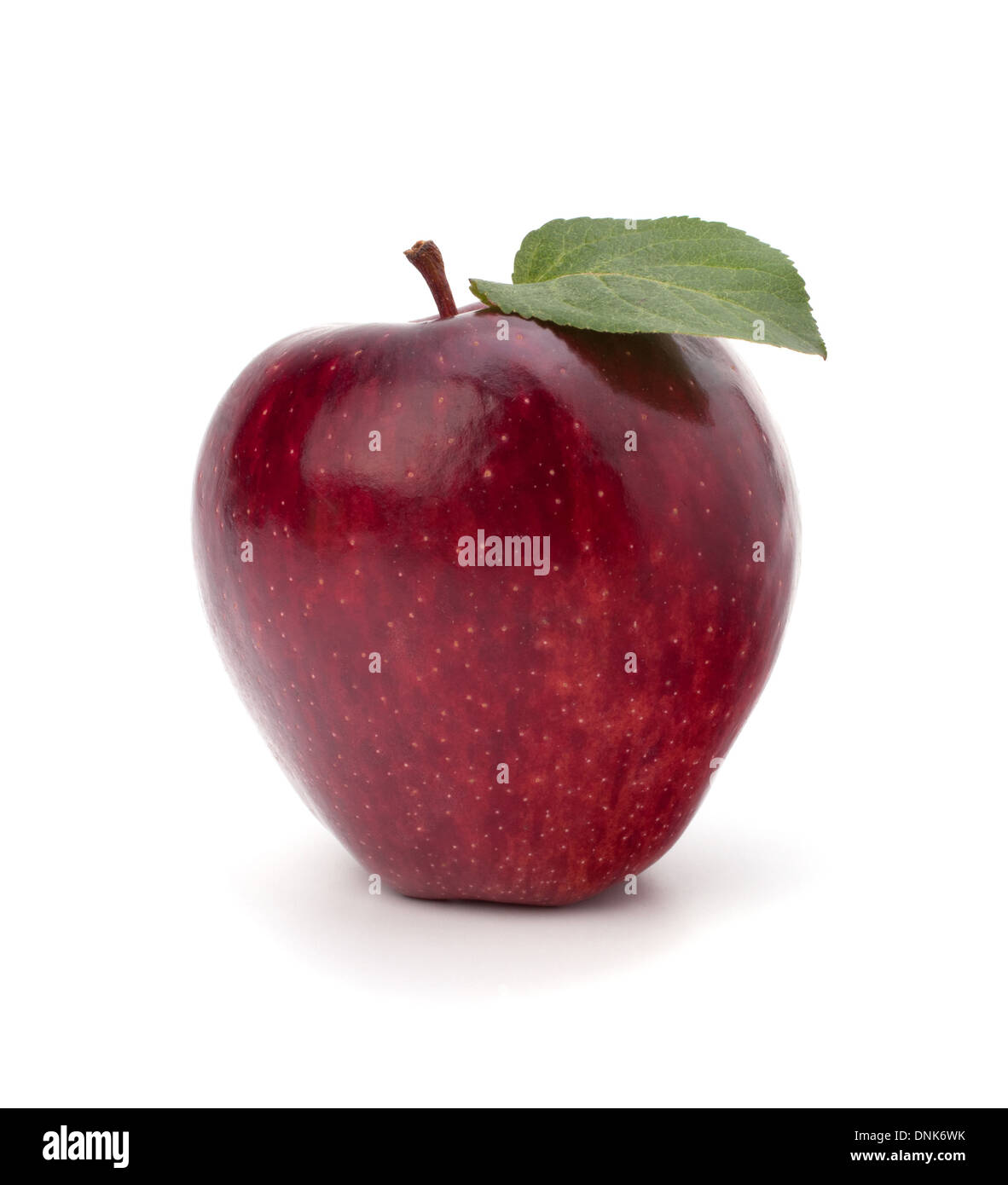 Sweet red apple with green leaf isolated on white background Stock ...