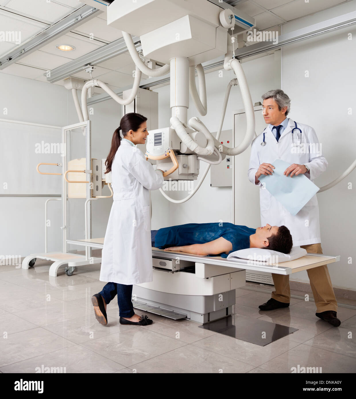 Indian female doctor holding xray hi-res stock photography and images ...