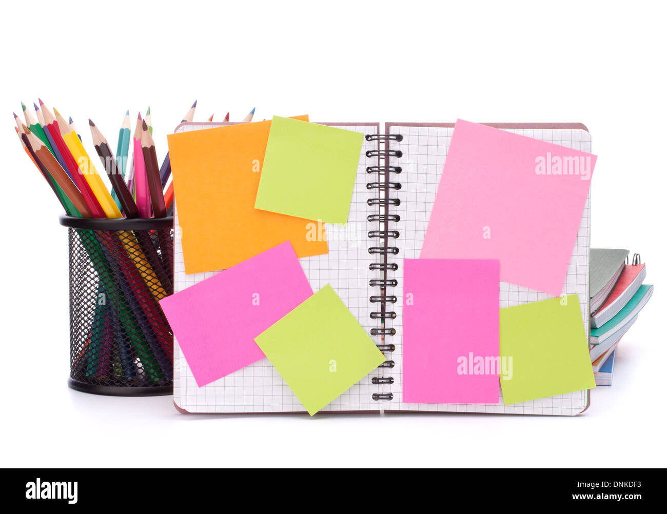 Blank checked notebook with notice papers isolated on white background cutout Stock Photo