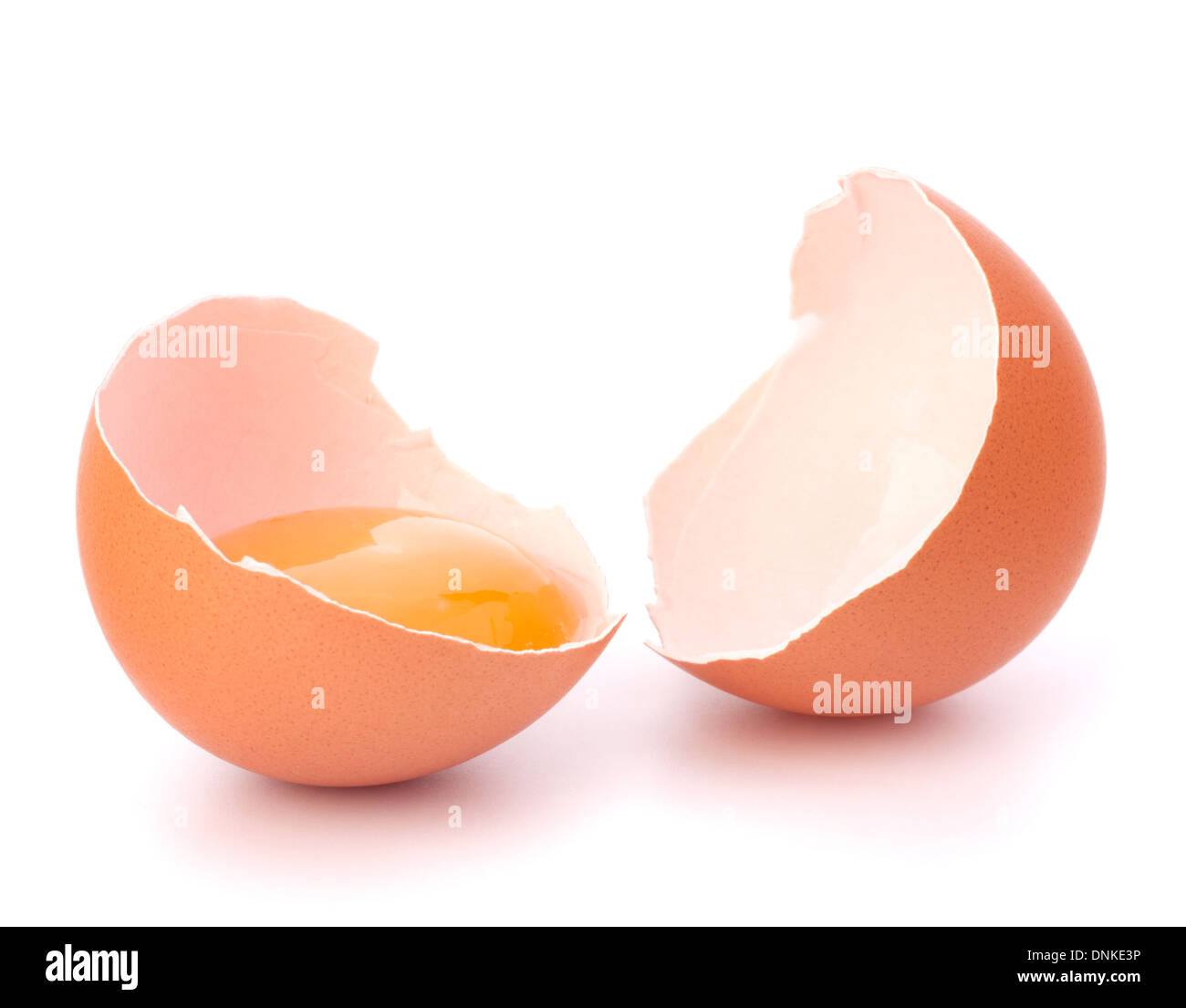 Broken egg isolated on white background Stock Photo - Alamy