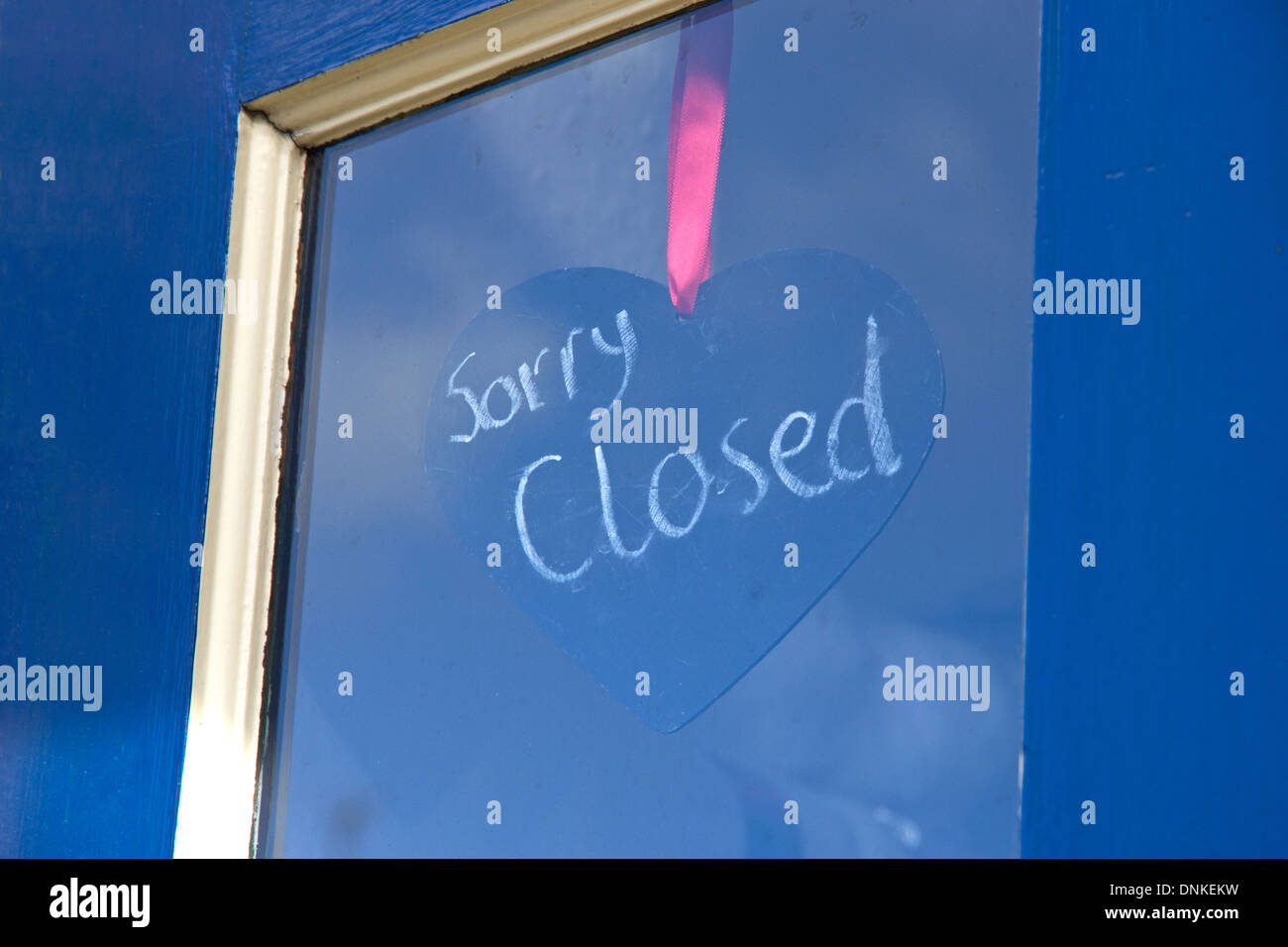 Sorry Closed Sign On Heart Shaped Blackboard Behind Shop Door Window Stock Photo Alamy