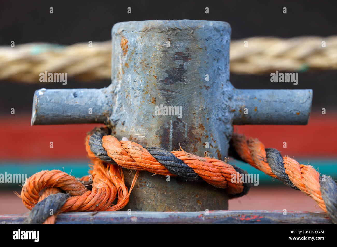 Bollard with a rope on a deck. Stock Photo