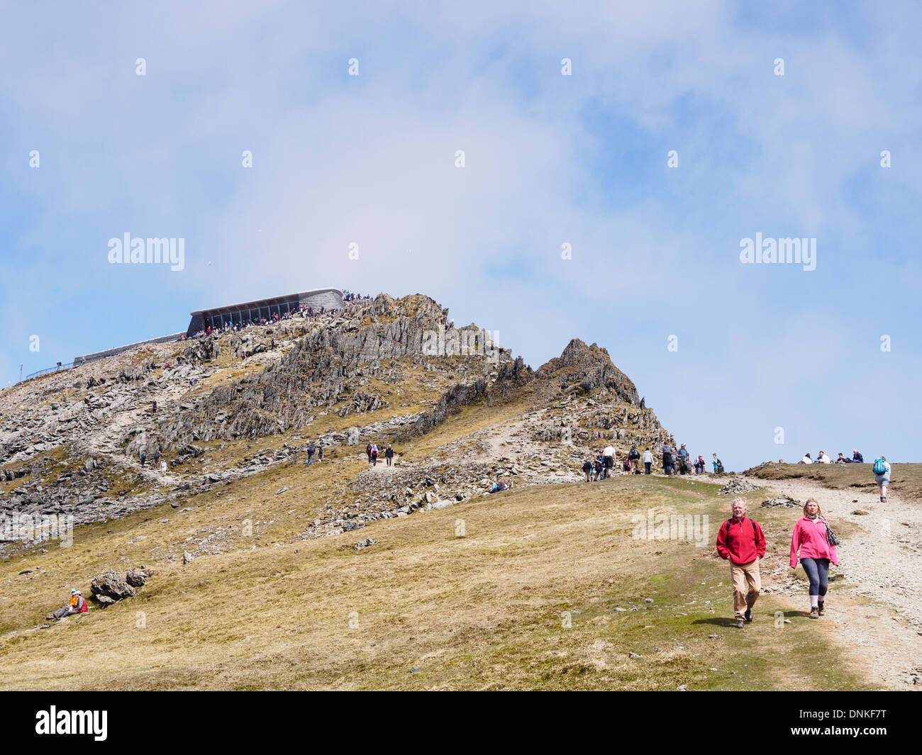 Walkers walking on Rhyd Ddu path from Mount Snowdon summit and cafe in Snowdonia National Park North Wales UK Britain Stock Photo