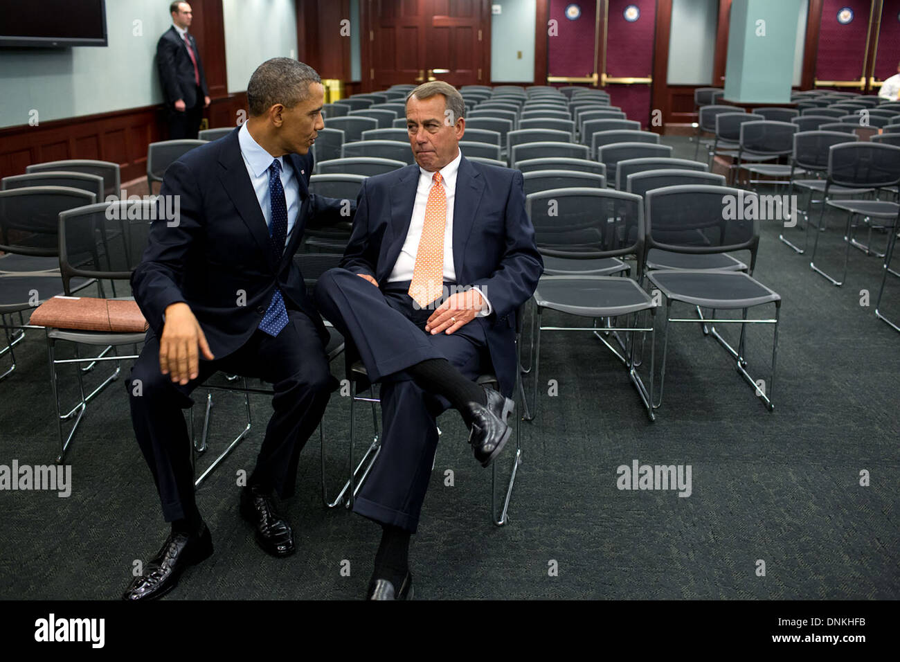 US President Barack Obama talks with House Speaker John Boehner after participating in a Question and Answer session with the House Republican Conference at the U.S. Capitol March 13, 2013 in Washington, DC. Stock Photo