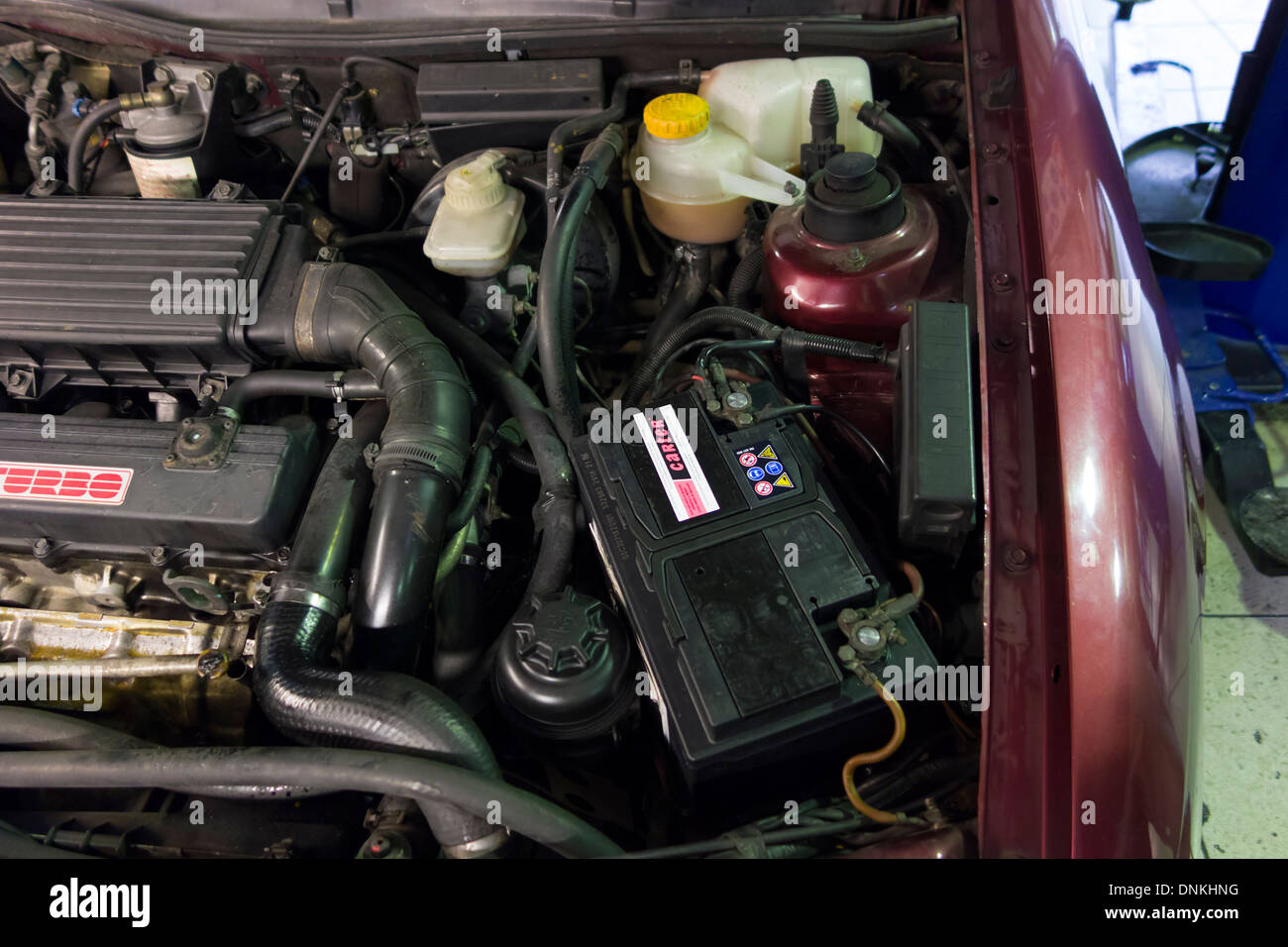 Car battery and engine Stock Photo Alamy