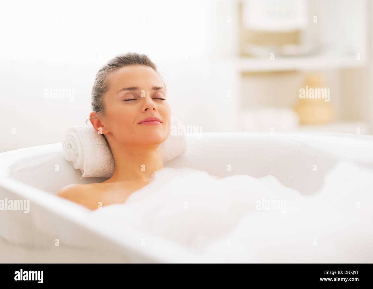 Happy young woman relaxing in hi-res stock photography and images - Alamy