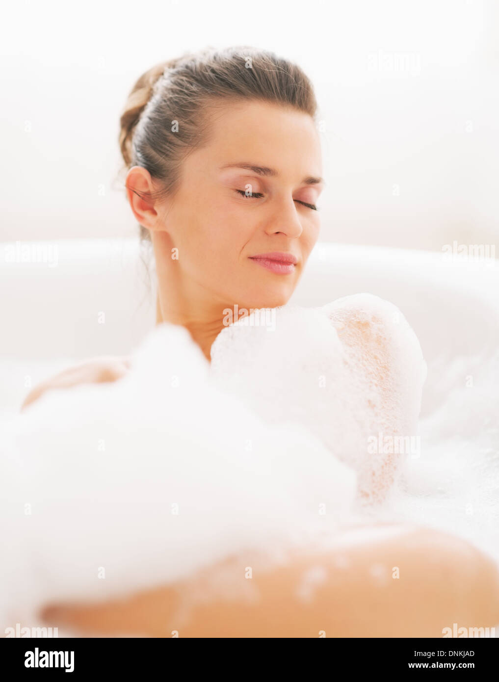 Laying in bathtub hires stock photography and images Alamy