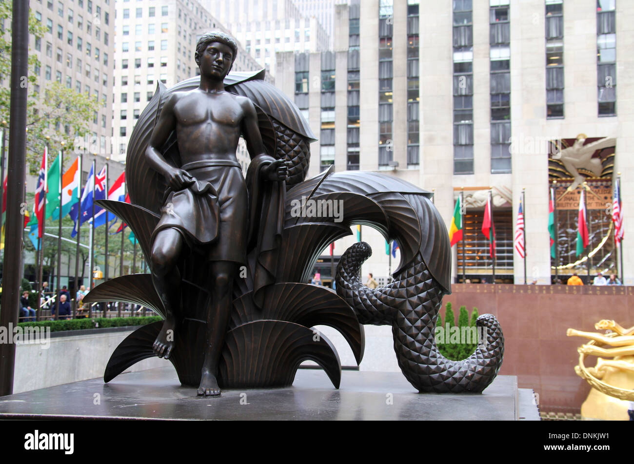 Youth at the Rockefeller Center in New York which is one of the bronze Mankind Figures Stock Photo