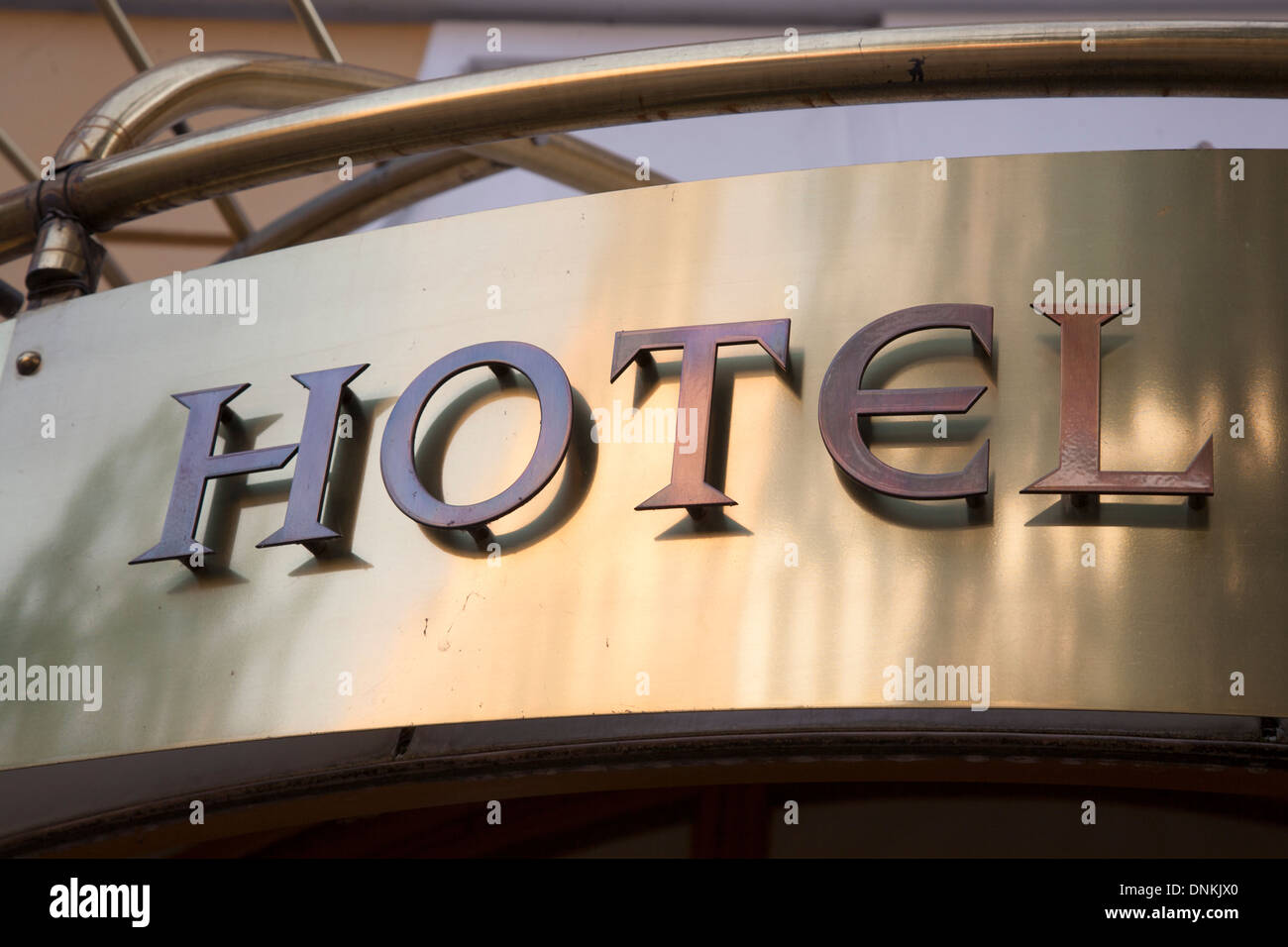 Hotel Sign on Gold Metal Background Stock Photo - Alamy