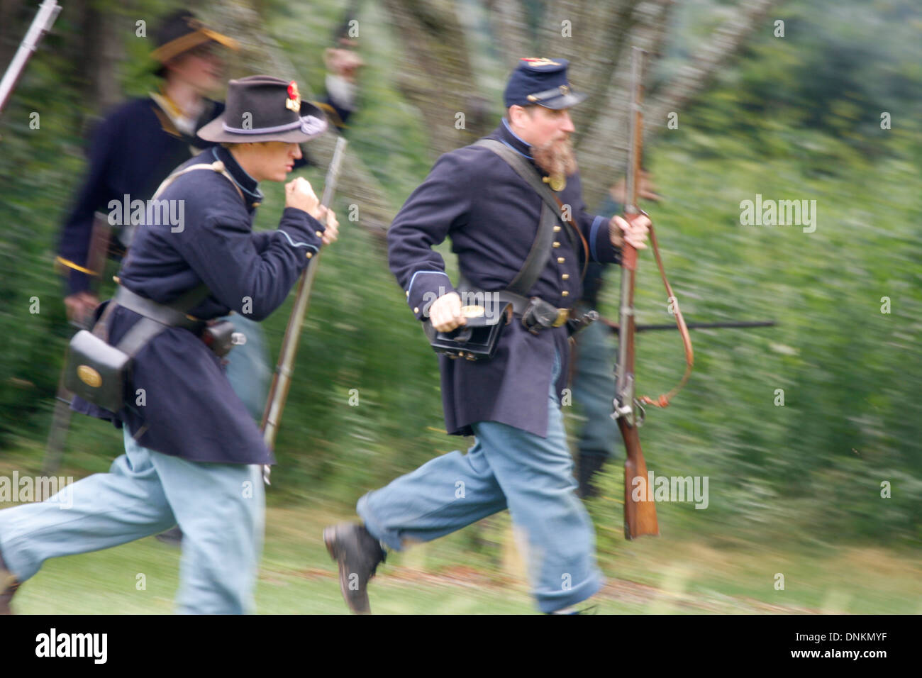 Union Soldiers running in a battle against the south in a Civil War