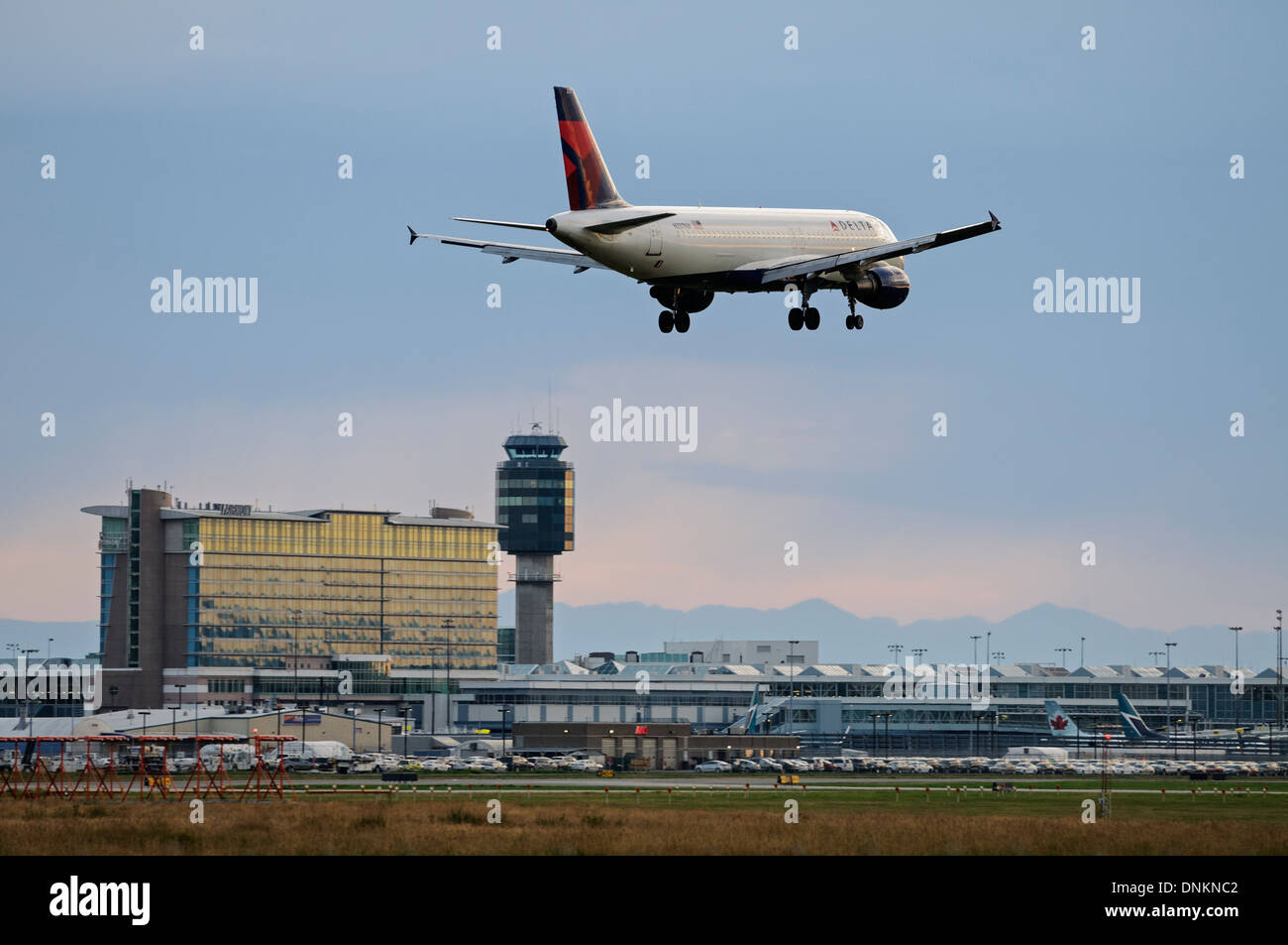 A Delta Air Lines Airbus A320 jetliner lands at Vancouver International Airport, Richmond, B.C., Canada. Stock Photo