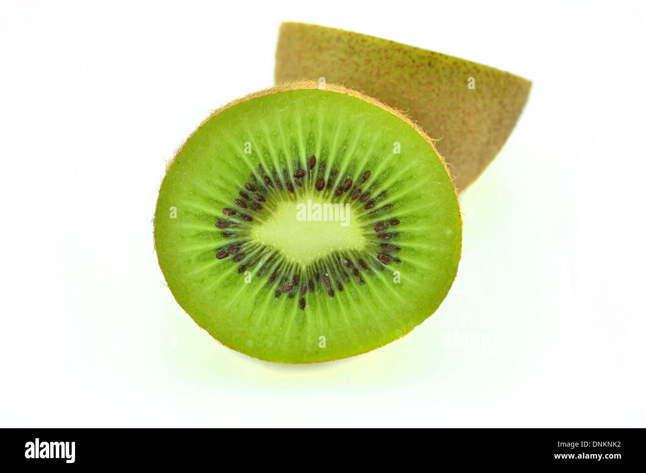 Whole kiwi fruit and his sliced segments isolated on white background Stock Photo