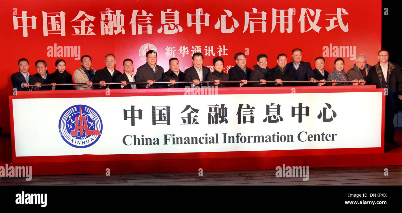 Shanghai, China. 1st Jan, 2014. People attend the opening ceremony of China Financial Information Center in Shanghai, east China, Jan. 1, 2014. China Financial Information Center is located in the Lujiazui Financial and Trade Zone in Shanghai's Pudong and officially opened on Wednesday. Credit:  Fan Jun/Xinhua/Alamy Live News Stock Photo