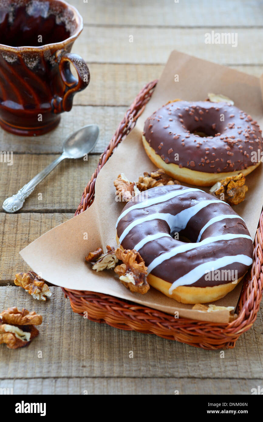 chocolate donuts with nuts, food closeup Stock Photo Alamy