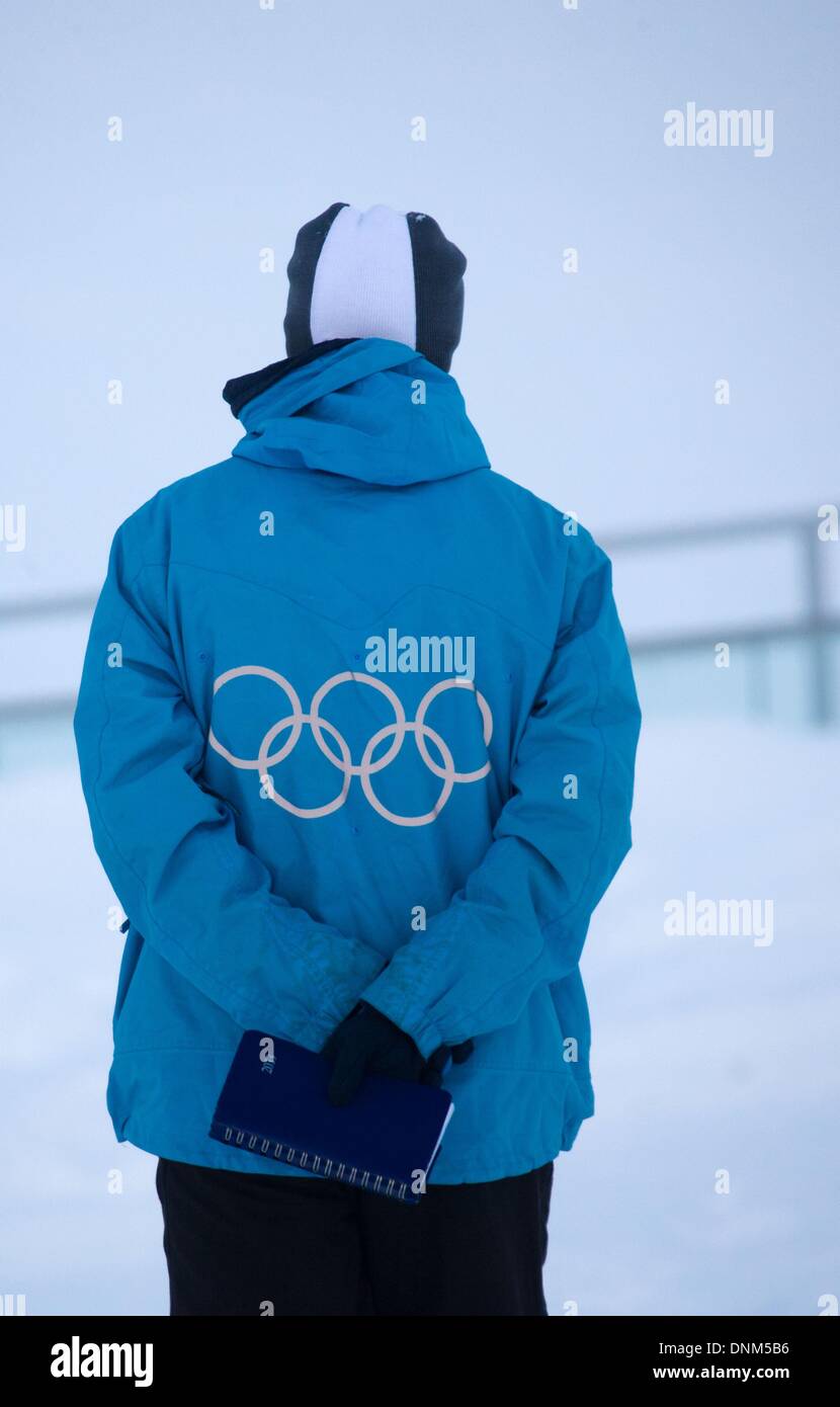 A man wears a jacket with the Olympic Rings on its back in the RusSki Gorki  Jumping Center in Krasnaya Polyana, Russia, 18 December 2013. Sochi will  host the Winter Olympic Games
