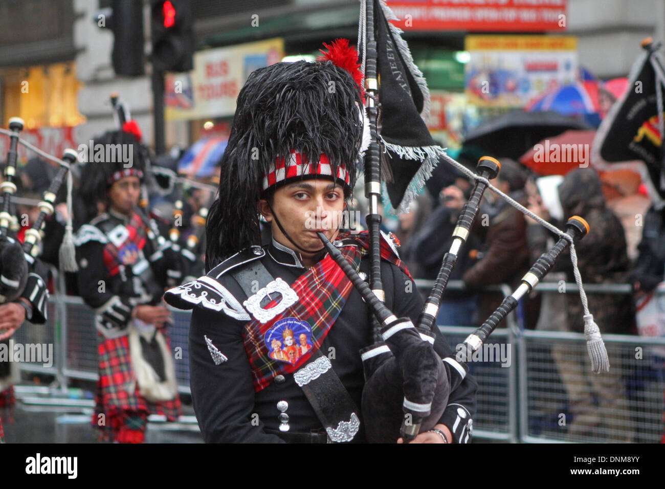 London,UK,1st January 2014,Highland Pipers at the London's New Year's Day Parade 2014 Credit: Keith Larby/Alamy Live News Stock Photo