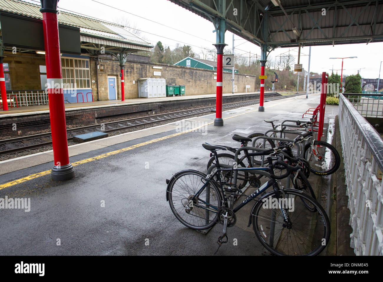 bicycle bike racks on station platform Stock Photo Alamy