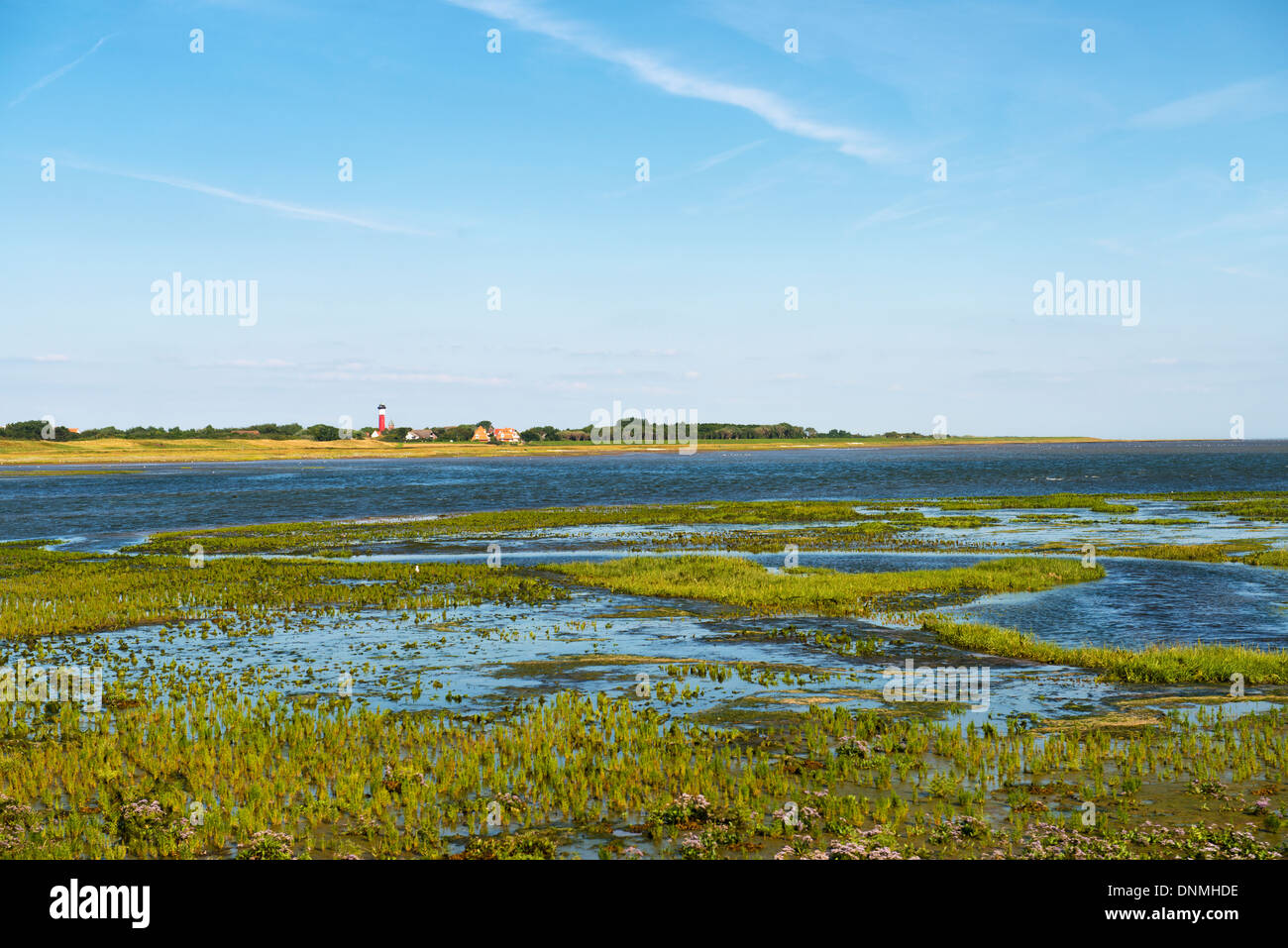 View of the island of Wangerooge in the German North Sea with old Lighthouse. Stock Photo