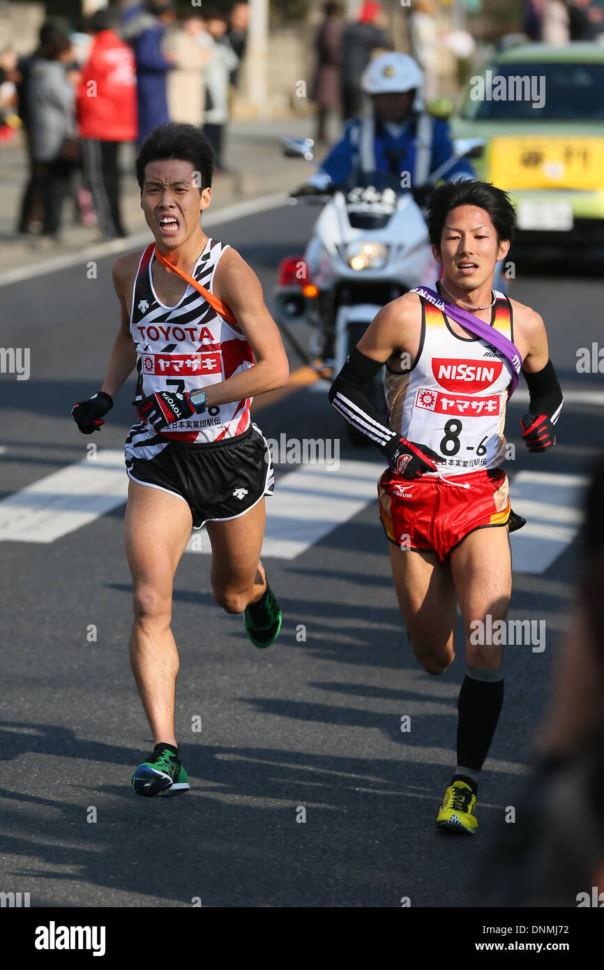 Gunma Prefecture Goverment, Gunma, Japan. 1st Jan, 2014. (L to R) Kenta Matsumoto (Toyota Moter), Satoshi Kitamura (Nissin Foods), JANUARY 1, 2014 - Ekiden : New Year Ekiden 2014 58th All Japan Industrial Ekiden Race Start & Goal at Gunma Prefecture Goverment, Gunma, Japan. Credit:  YUTAKA/AFLO SPORT/Alamy Live News Stock Photo