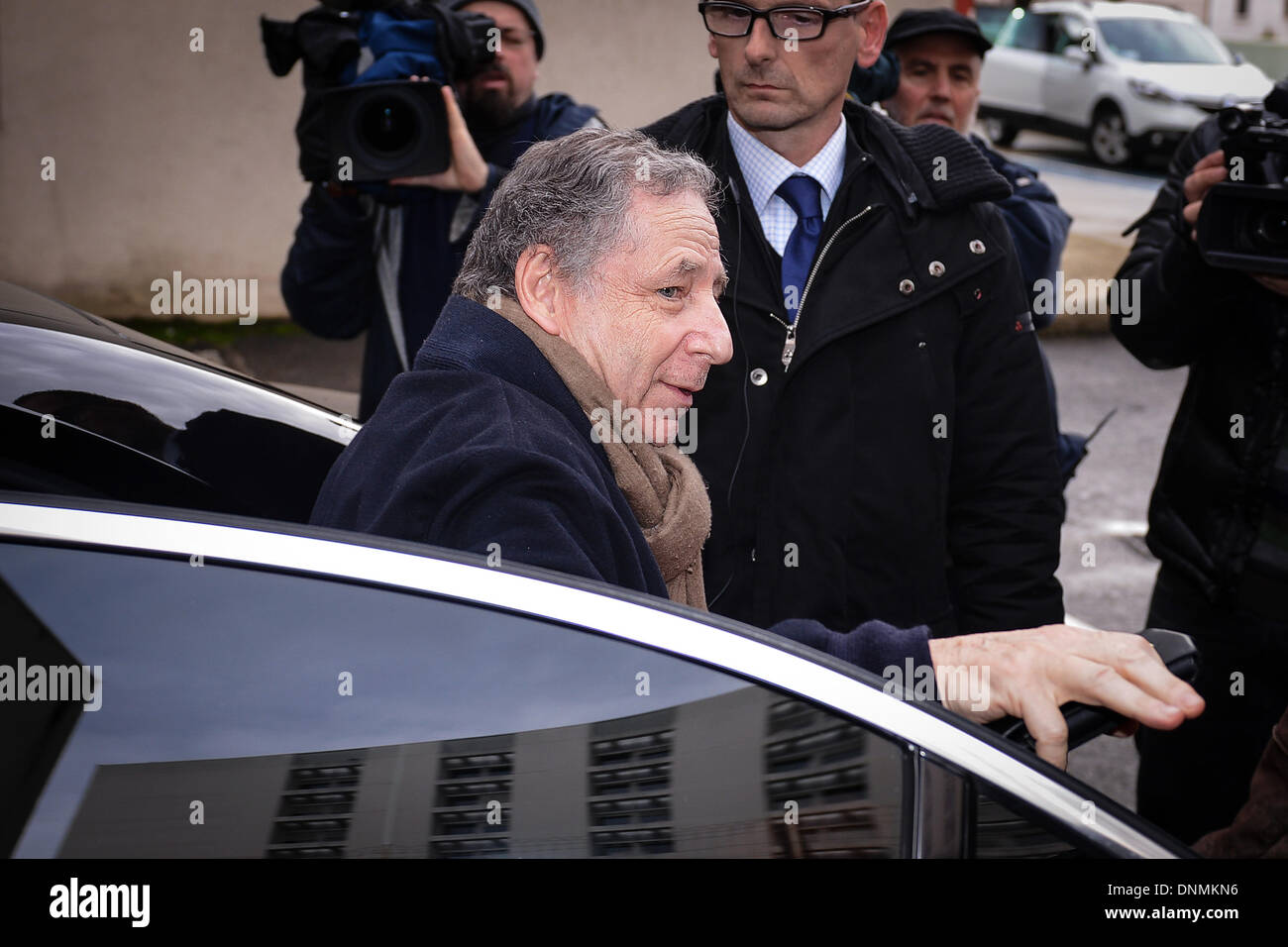 Grenoble, France. 02nd Jan, 2014. President of the Federation Internationale de l'Automobile (F.I.A.) Jean Todt in front of 'Centre Hospitalier Universitaire' (CHU) hospital in Grenoble, near the French Alps, France, 02 January 2014. Retired Formula One German racing driver Michael Schumacher is still in a critical condition, after he underwent emergency surgery after being admitted in a coma with a cranial trauma following a ski accident in Meribel, according to the hospital in Grenoble. Photo: David Ebener/dpa/Alamy Live News Stock Photo