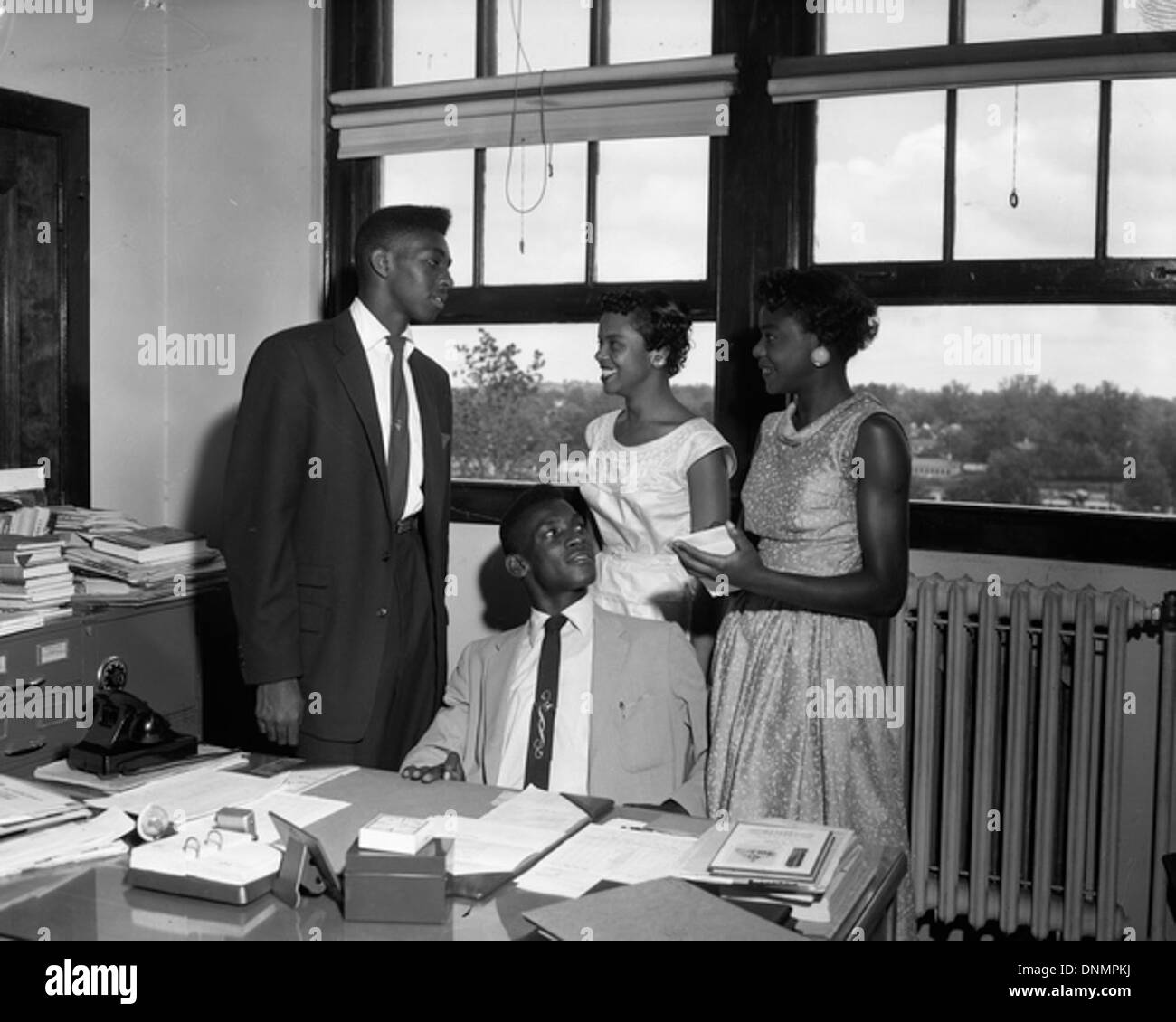 This image from the 1950s shows African American teenagers participating in Student Government Day at FAMU High School in Tallahassee, Florida. It represents student leadership and engagement. Stock Photo