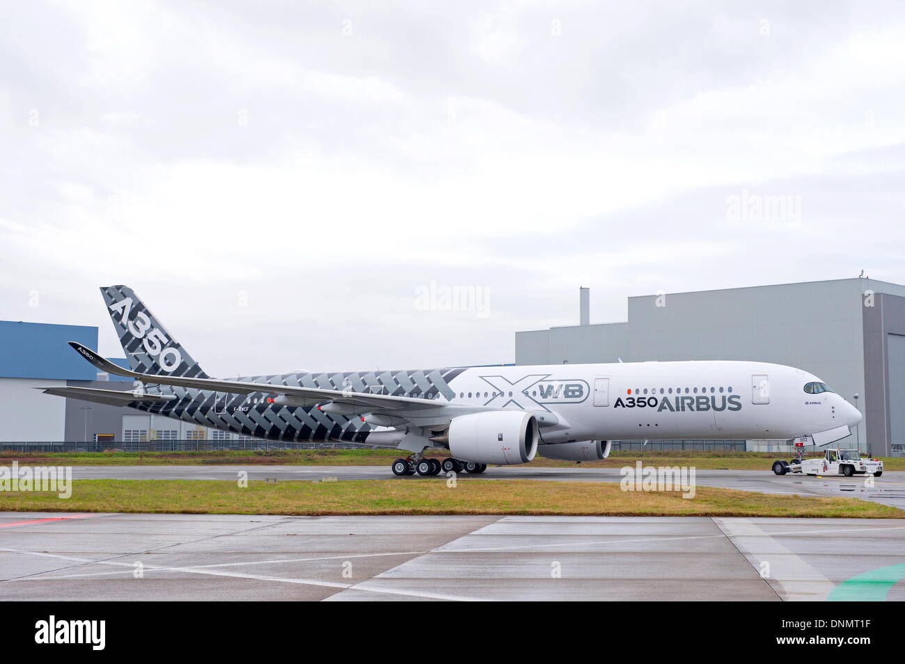 Toulouse, France. 2nd January 2014. Photo provided by Airbus Group shows the A350 MSN2 with special 'Carbon' livery is seen in the factory in Toulouse, southern France, Jan. 2, 2014. Airbus rolled-out its third A350 XWB flight-test aircraft, MSN2, from the paint shop in Toulouse, marking yet another successful milestone on the path to entry-into-service in Q4 2014. Credit:  Xinhua/Alamy Live News Stock Photo