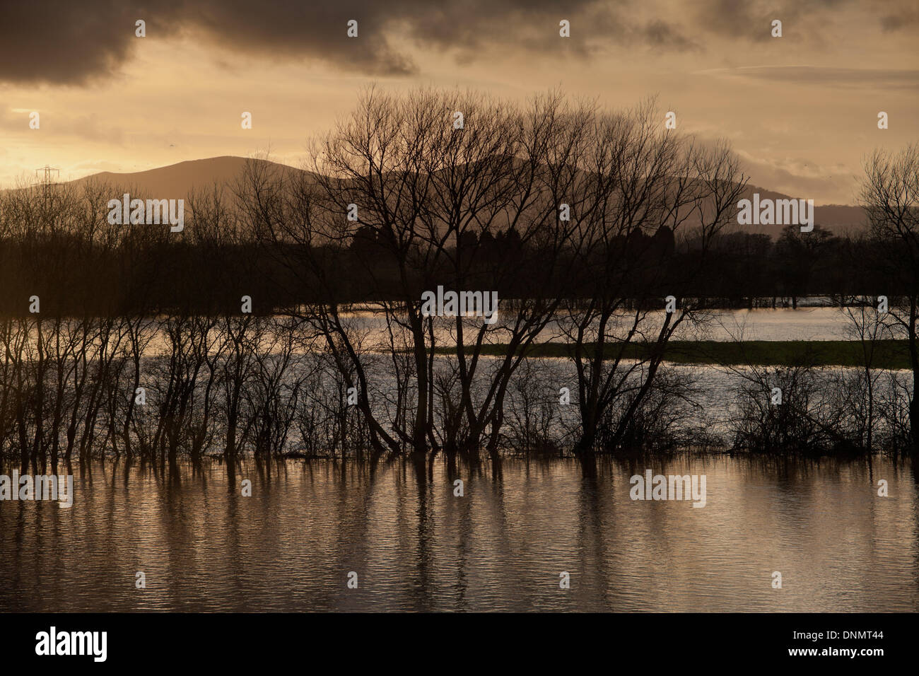 The river Severn floods the farm land around the bridge over the River